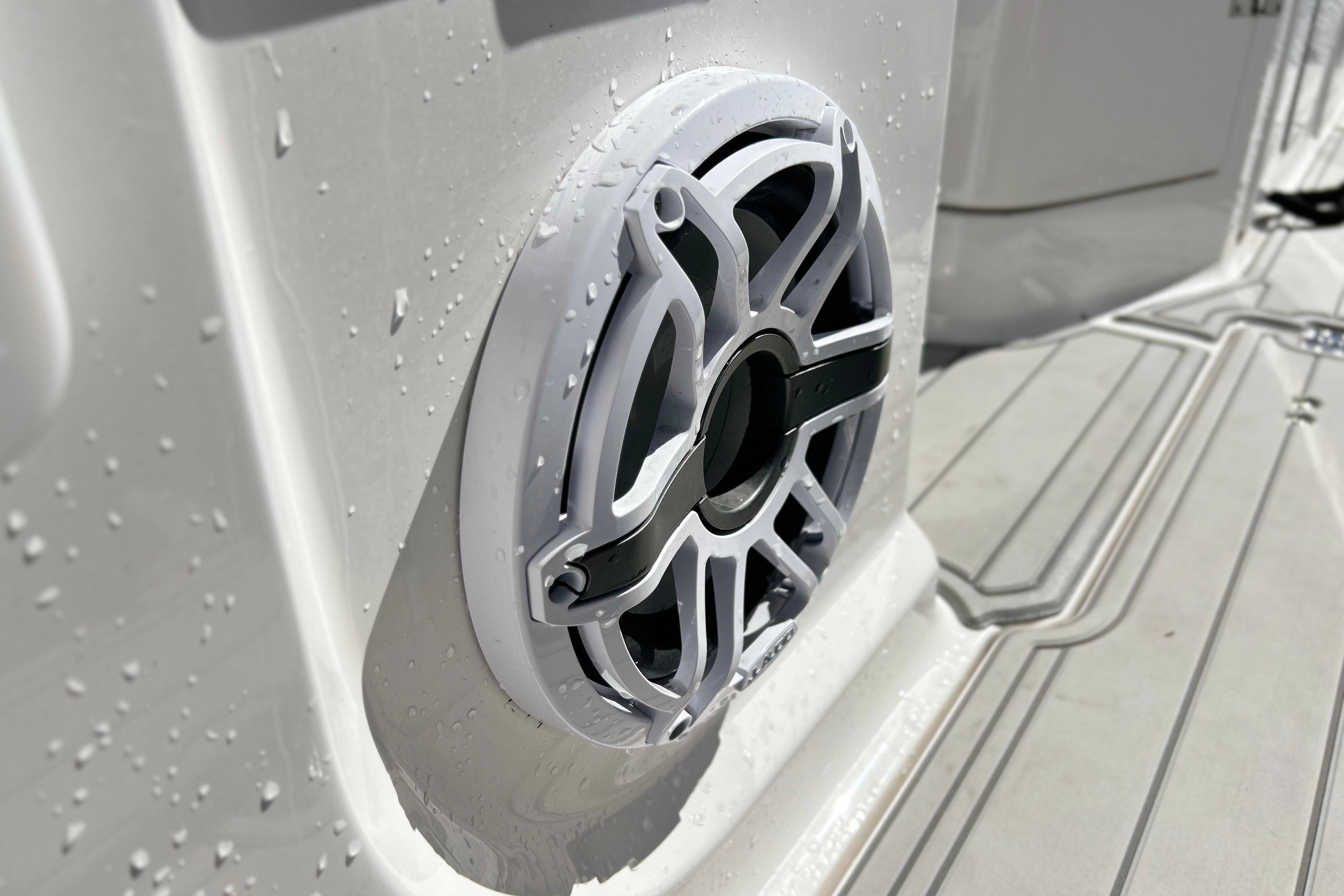 Close-up of a speaker on a 2025 Sea Fox 288 Traveler boat, with water droplets.