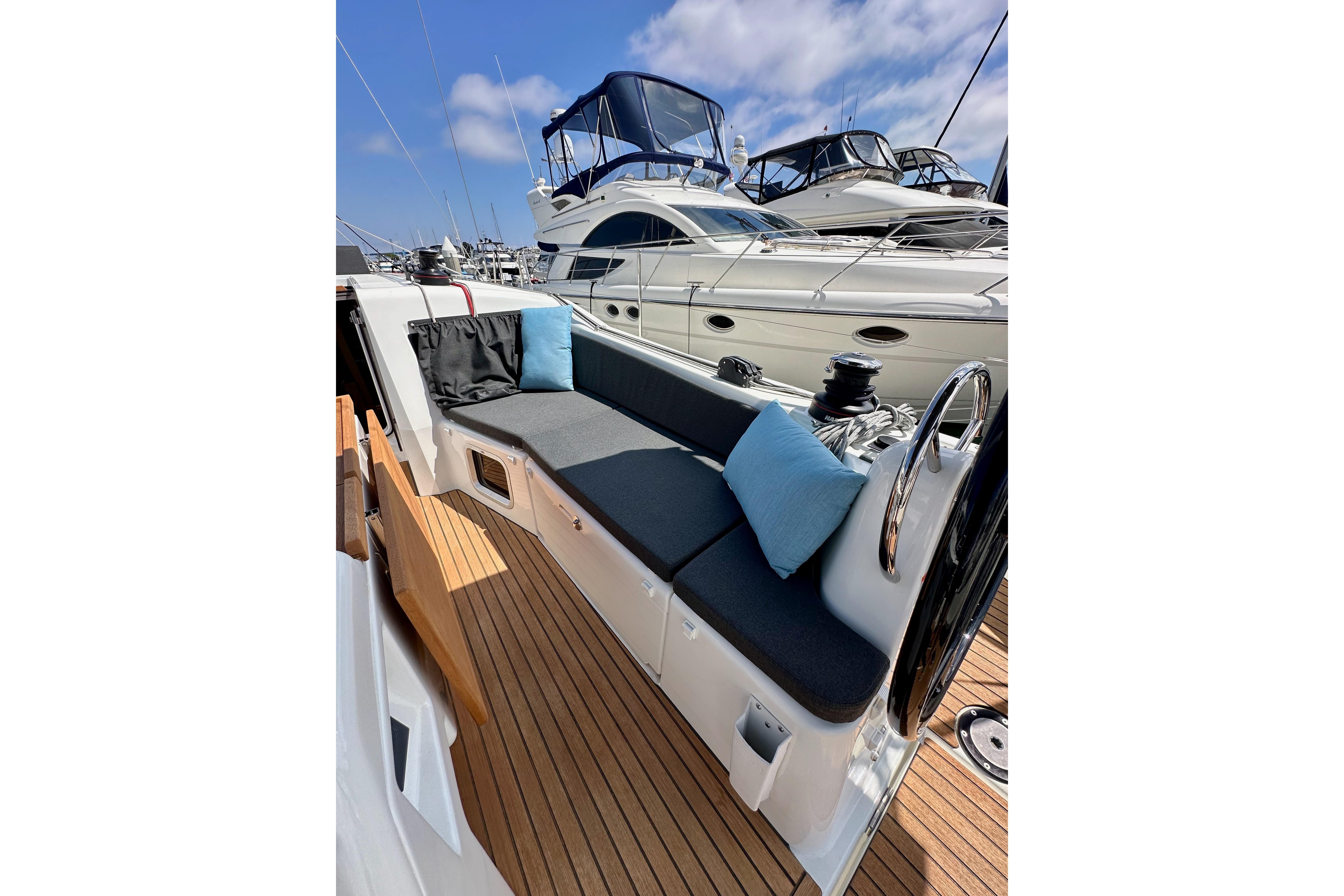 2024 Jeanneau Sun Odyssey 410 sailboat with sleek deck and comfortable seating.