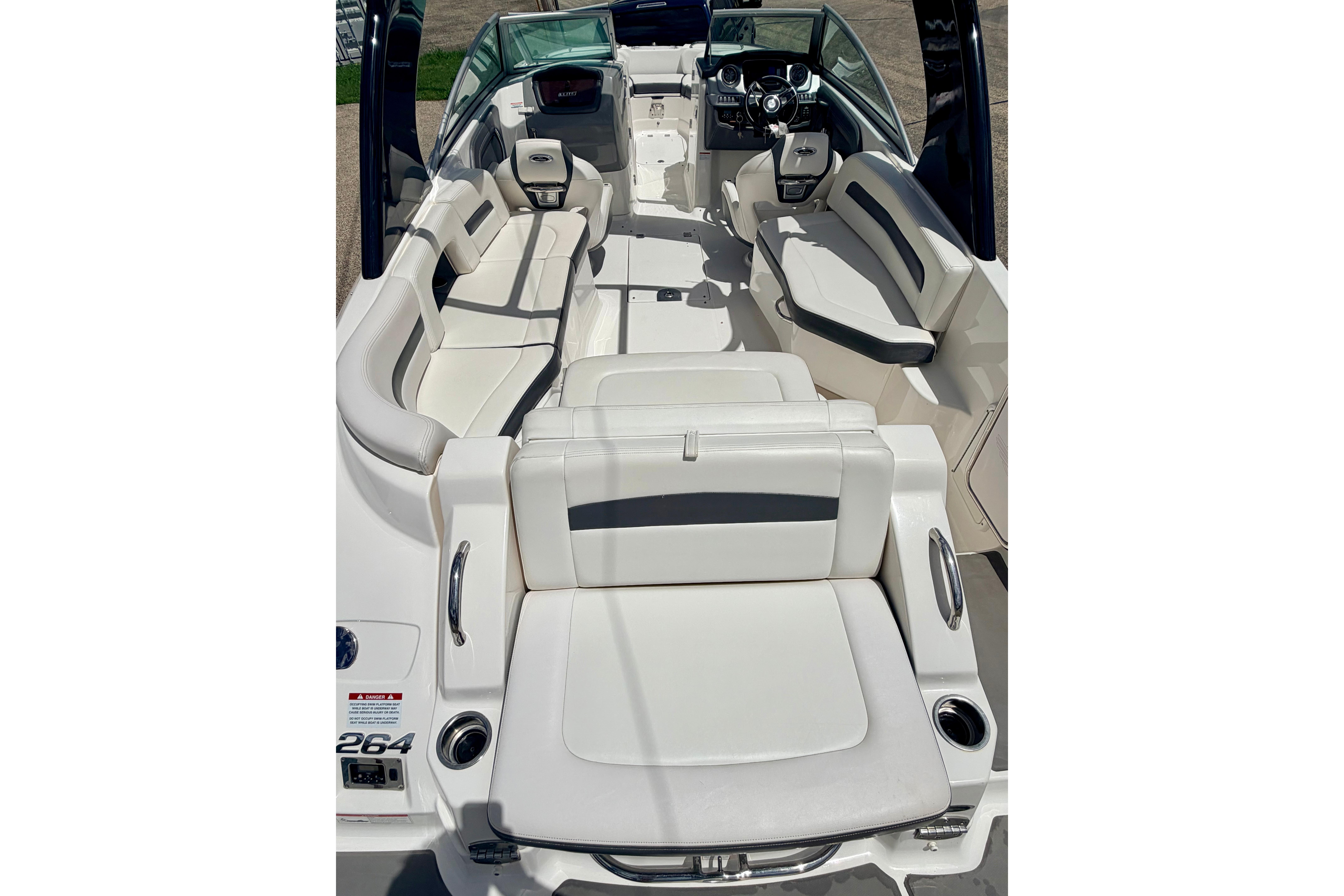 2015 Chaparral Sunesta 264 boat interior with spacious seating and modern design.