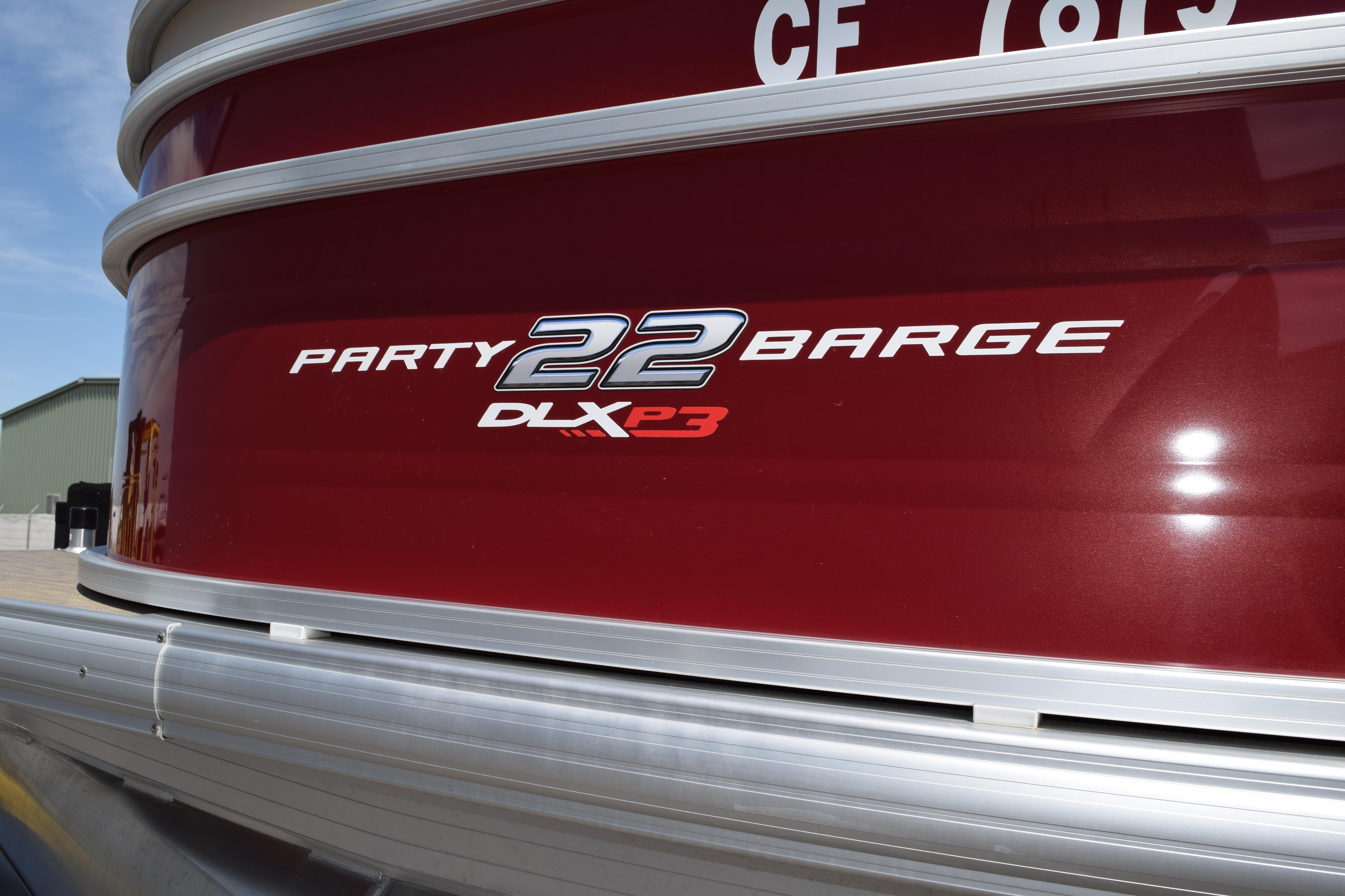 2025 Sun Tracker Party Barge 22 XP3, red exterior with model branding.