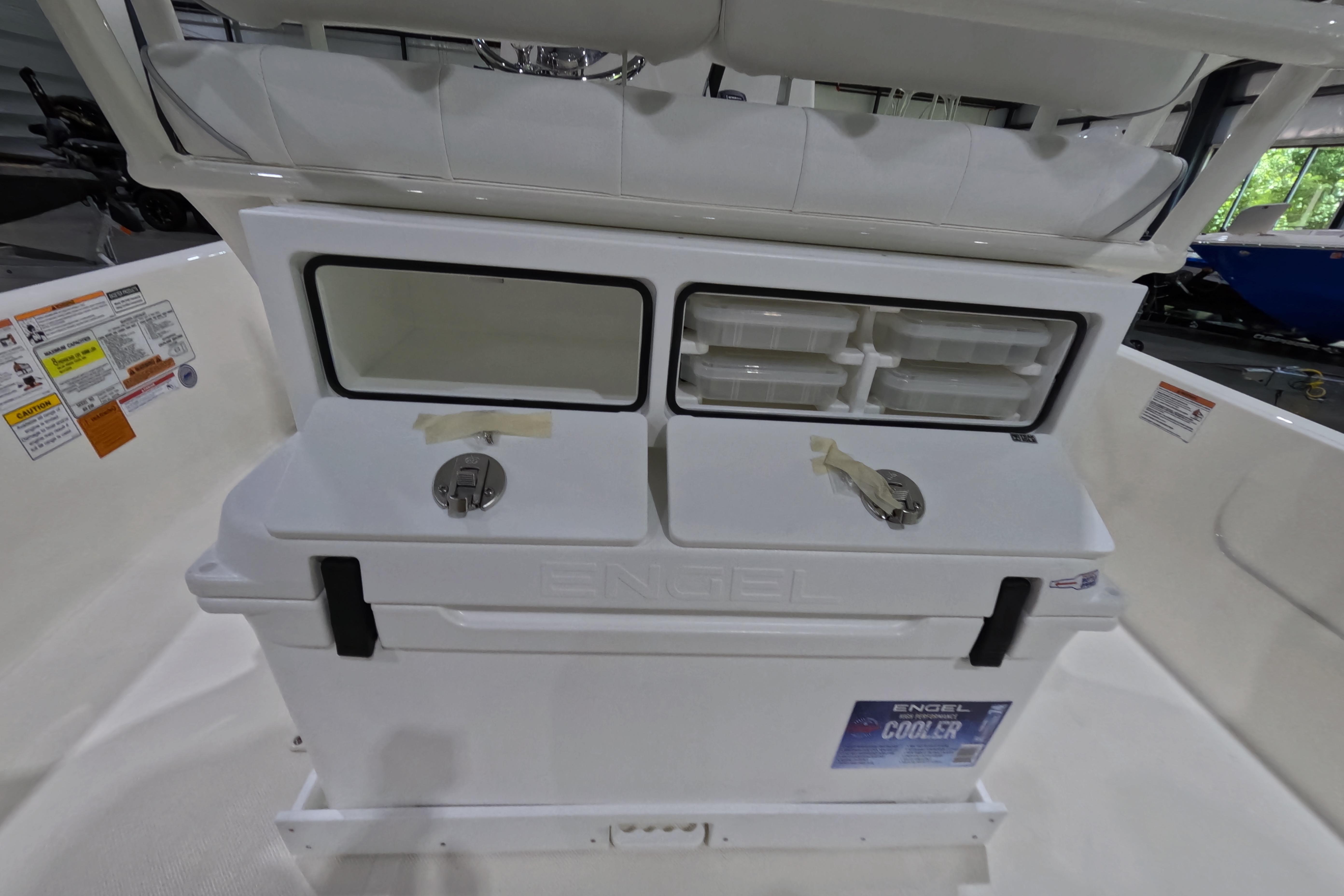 2026 Skeeter SX230 boat interior with Engel cooler and storage compartments.