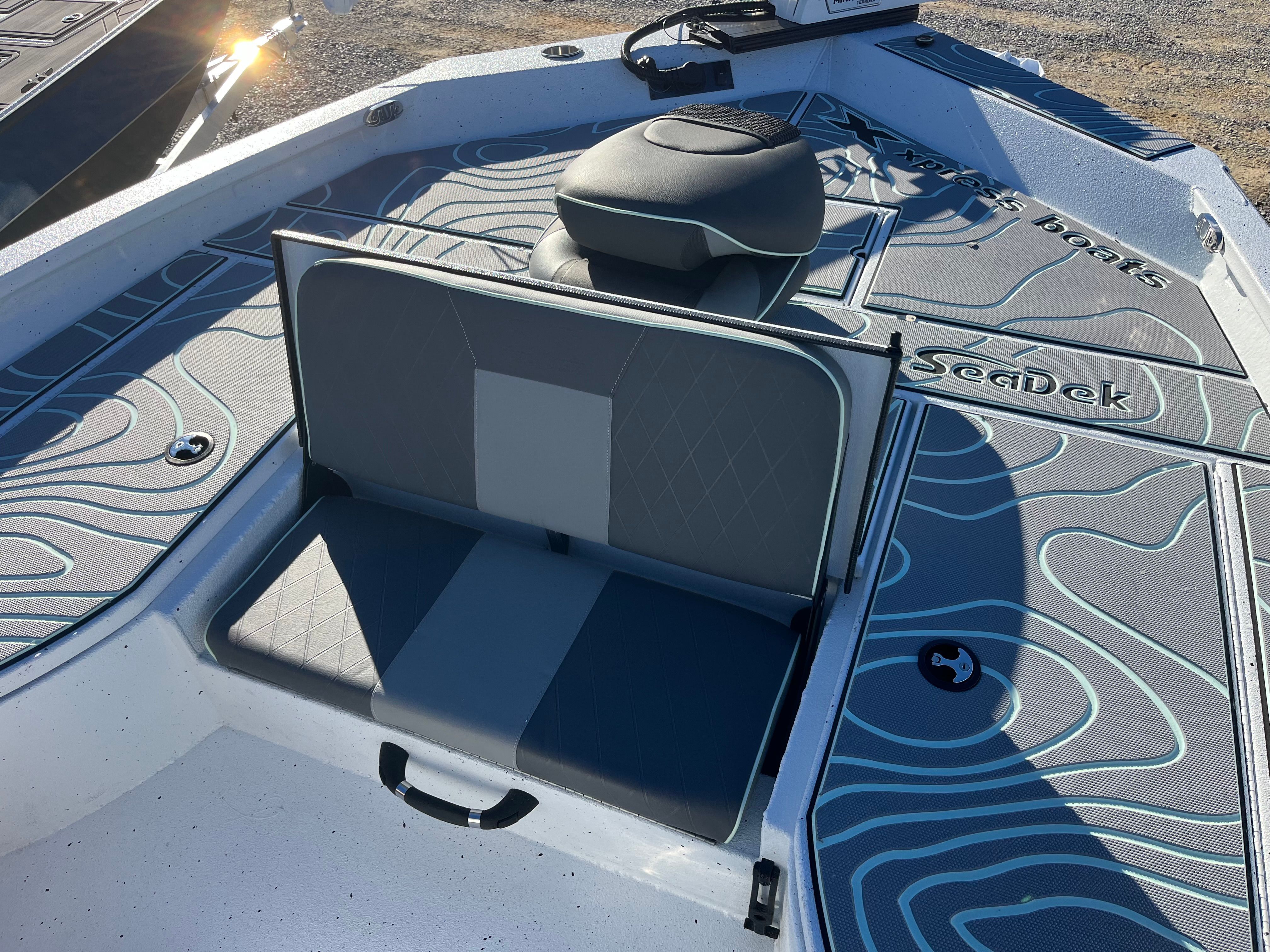 2024 Xpress X23B Bay Lounge boat with SeaDek padding.