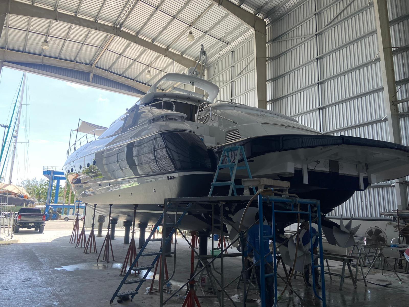 Sunseeker Predator 80 yacht in a boatyard, undergoing maintenance, 2000 model.