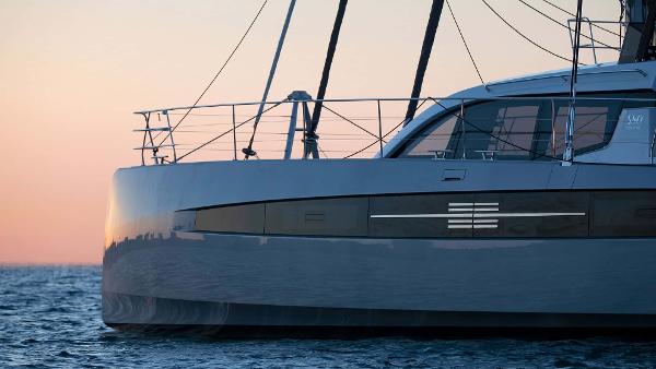 Luxury Privilege Signature 580 yacht at sunset, 2025 model, on calm ocean waters.