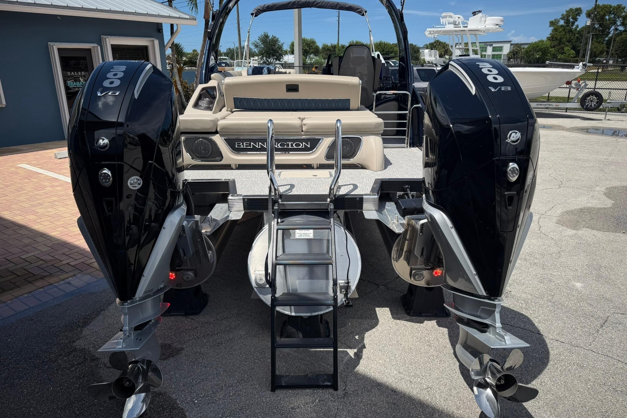 2026 Bennington 27 QSBAT2 boat with dual 300 V8 engines, rear view.
