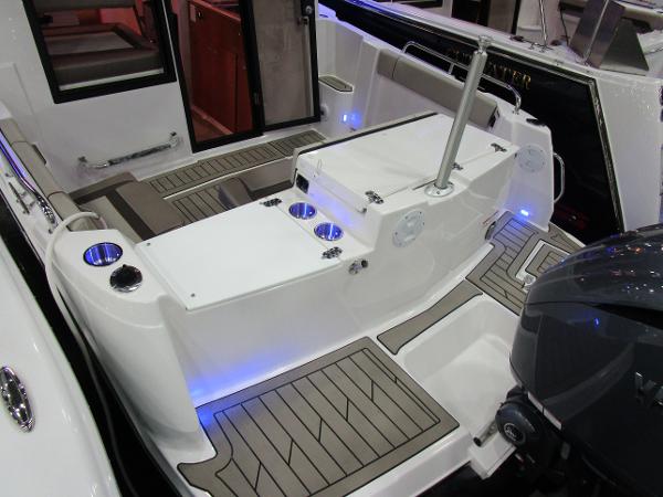 2025 Cutwater C-248 Coupe boat interior with seating and modern design.