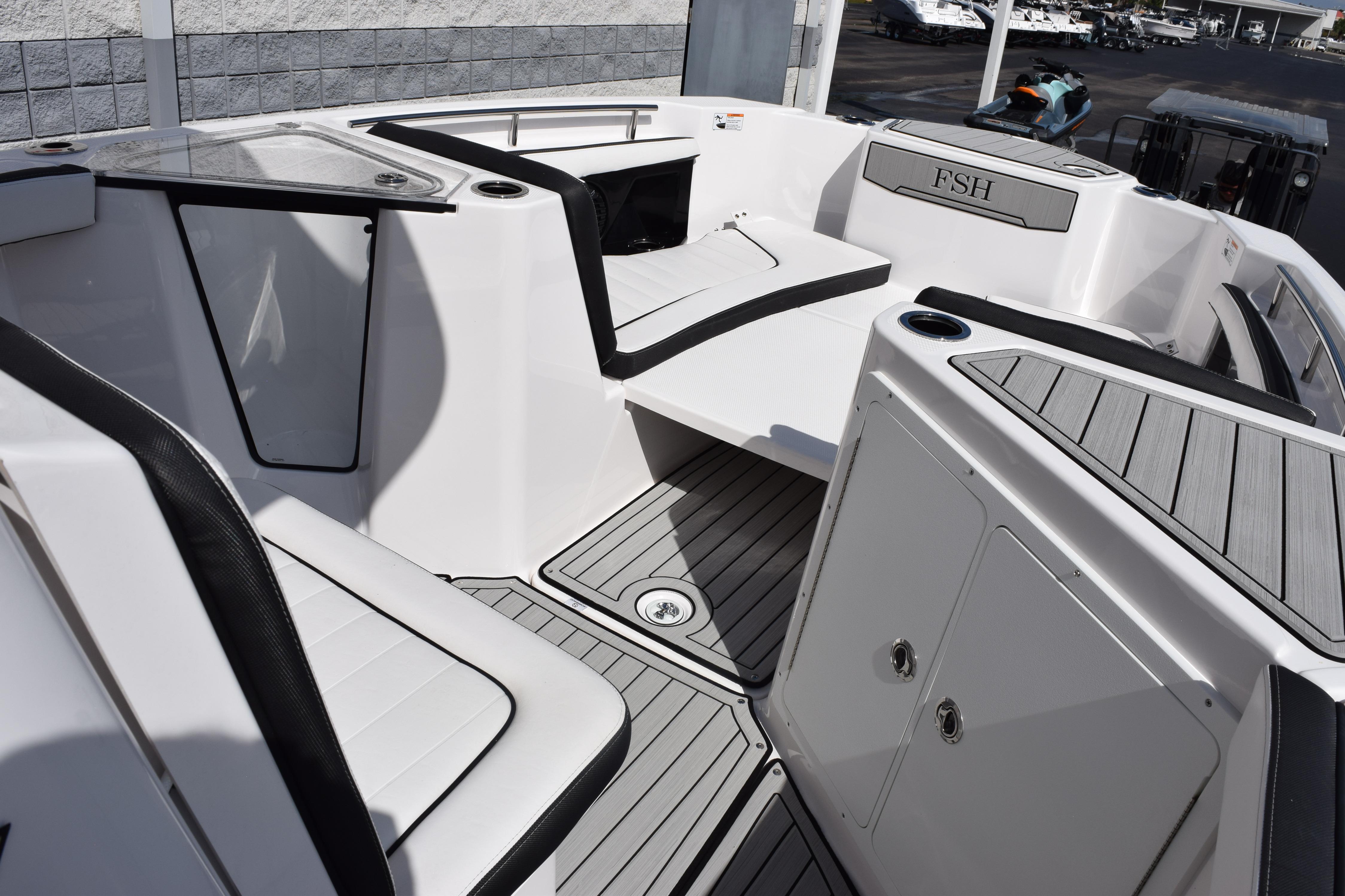 2026 Yamaha Boats 255 FSH Sport H interior, featuring sleek seating and modern design elements.