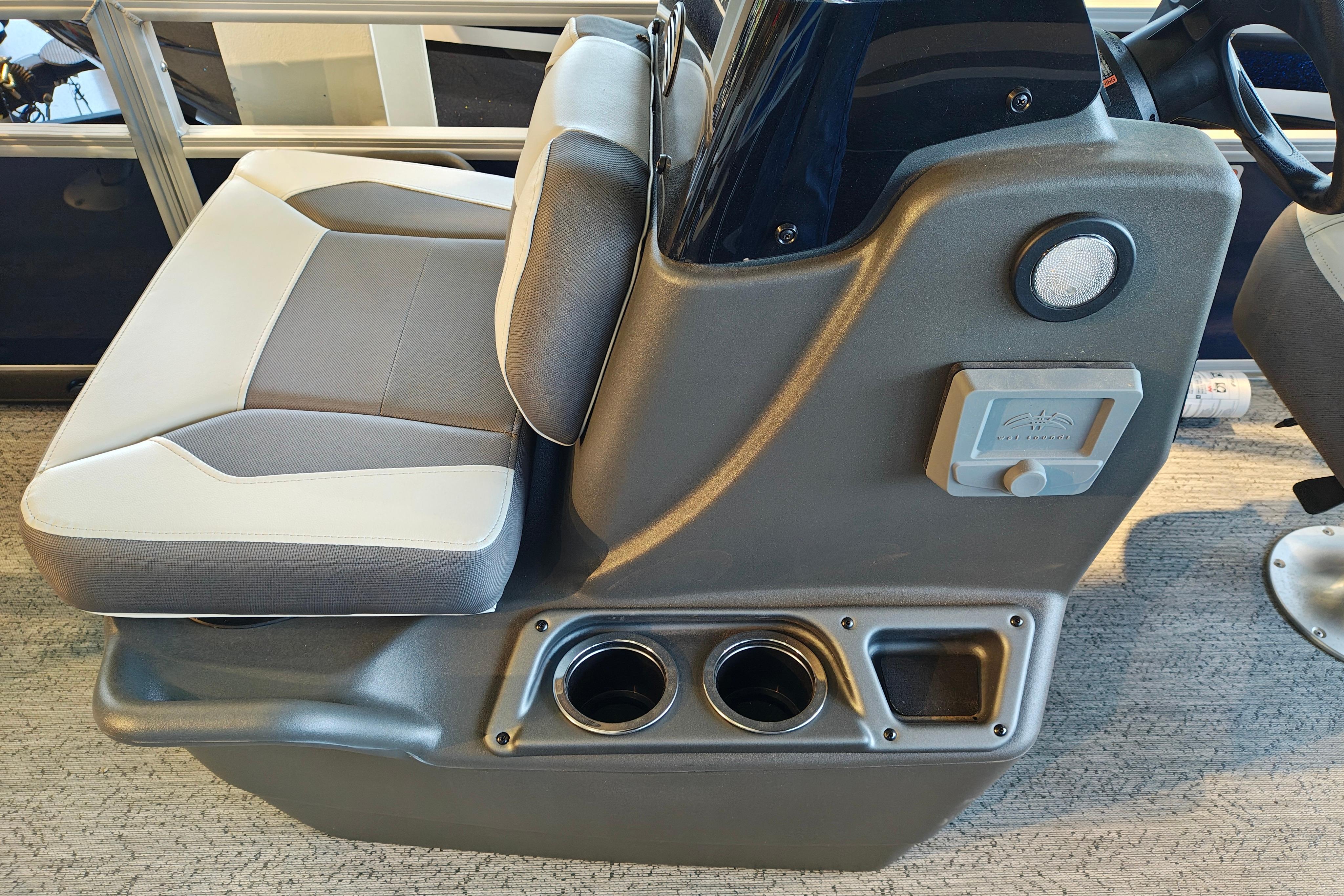 2026 Sun Tracker Bass Buggy 16 XL Select boat interior with seating and cup holders.