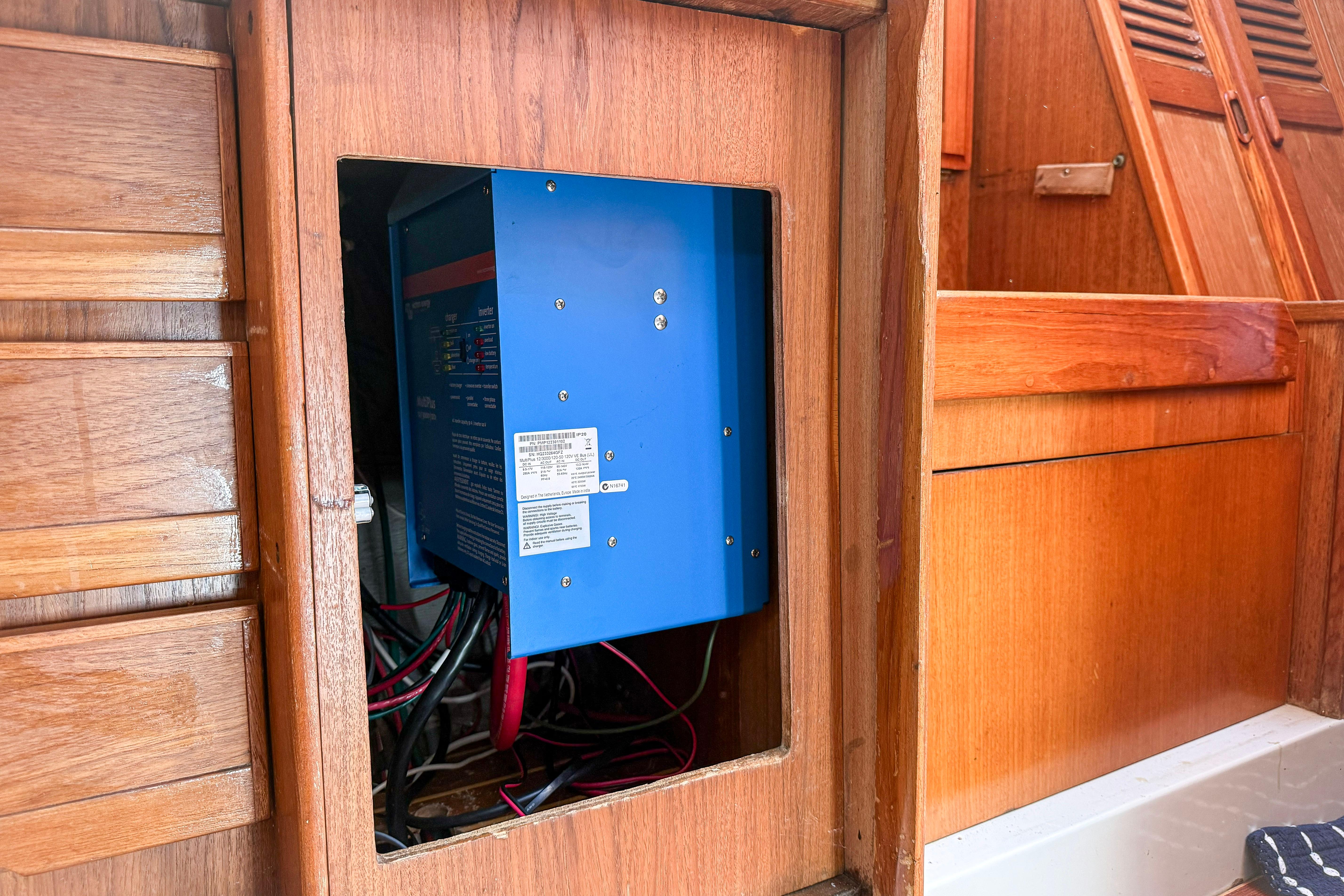 Electrical panel inside 1988 Oday 40 sailboat with wooden interior.