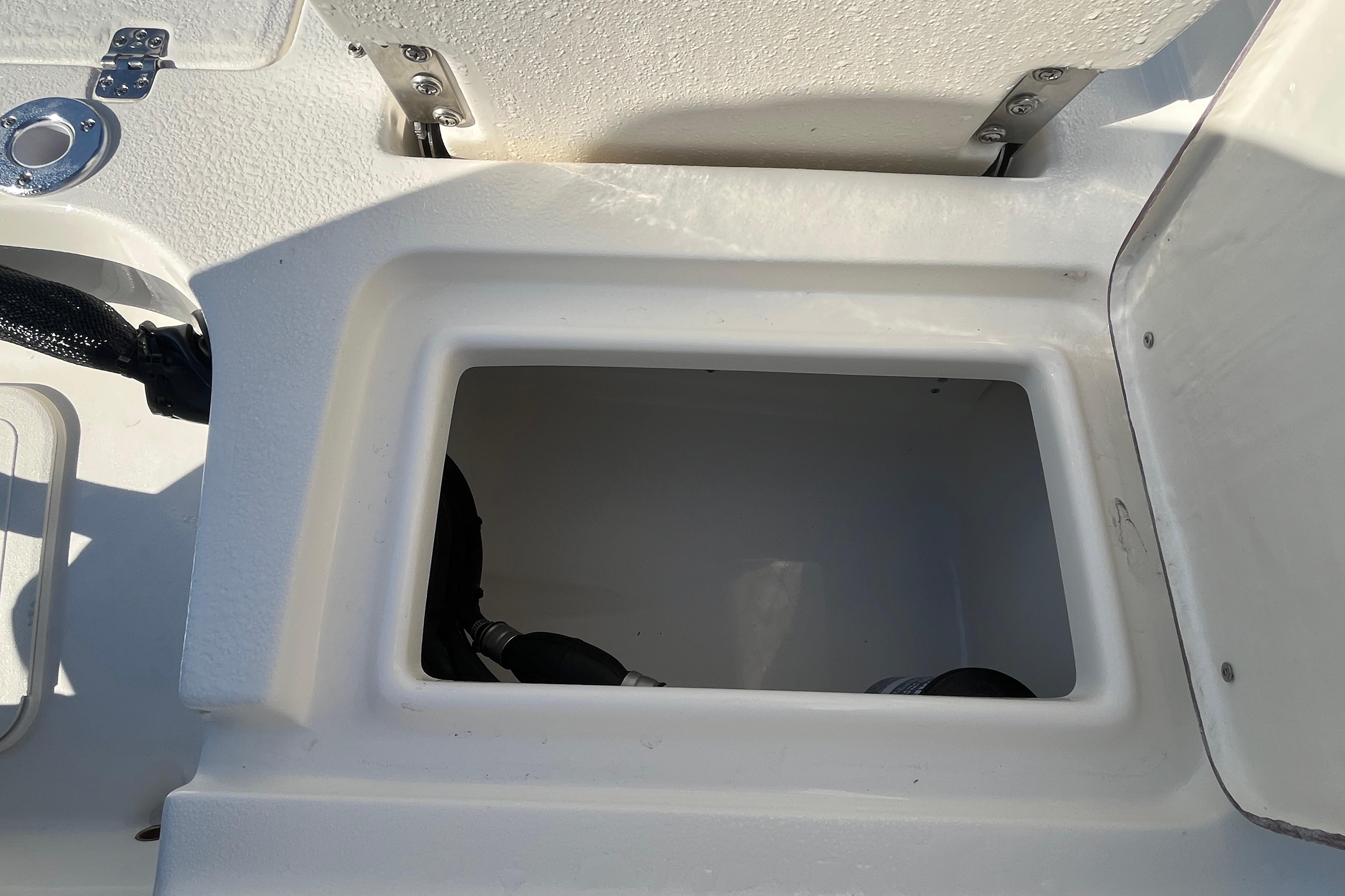 Open storage compartment on a 2026 Bulls Bay 2200 boat.