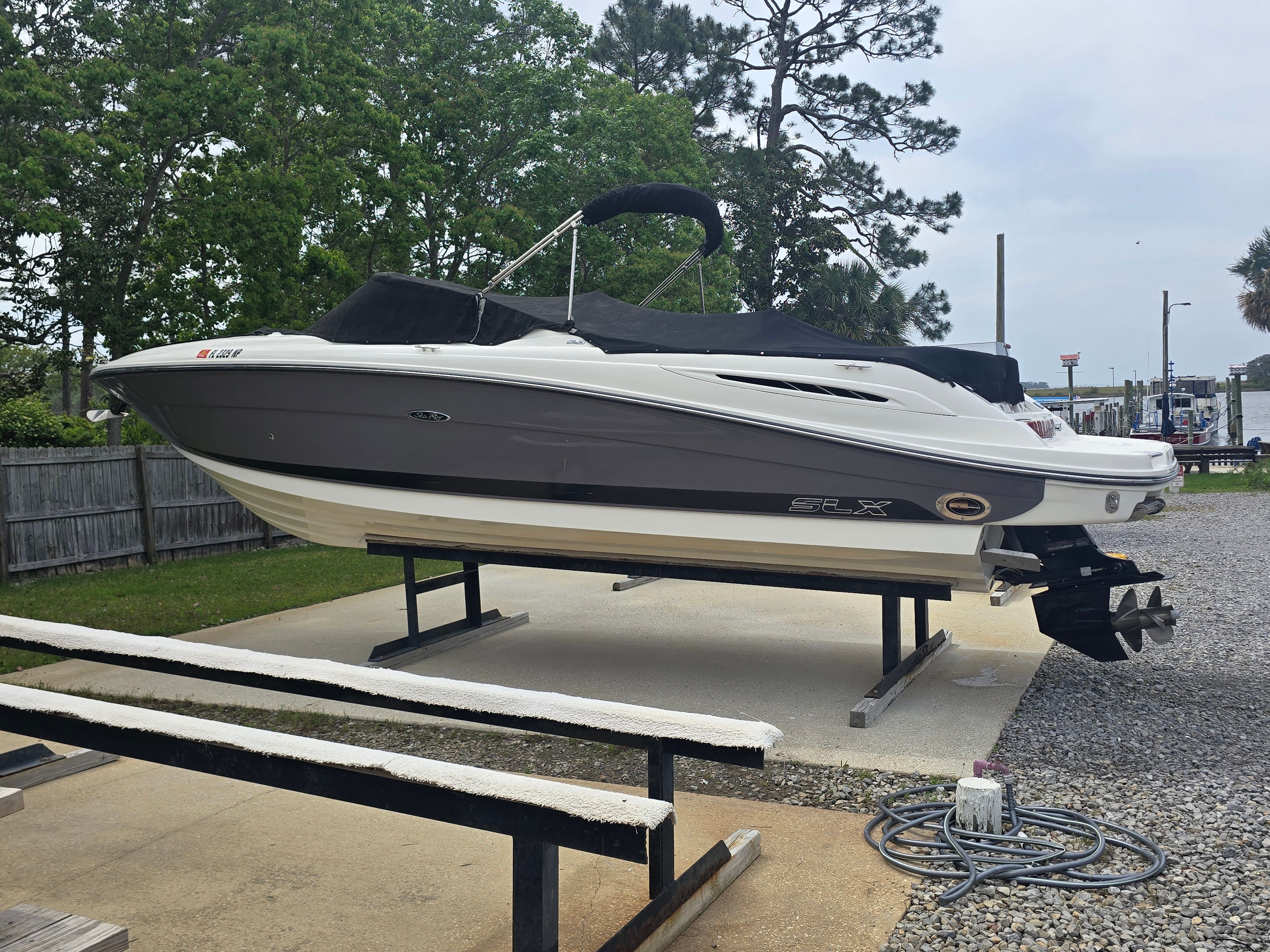 2007 Sea Ray 270 Select EX boat on an outdoor stand.
