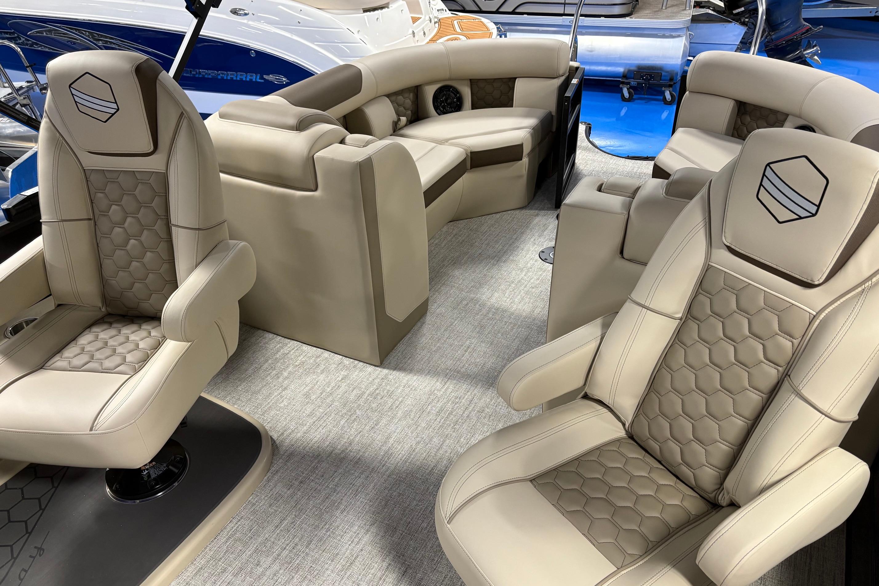 Luxurious interior of 2026 South Bay 523RS boat with plush seating and modern design.