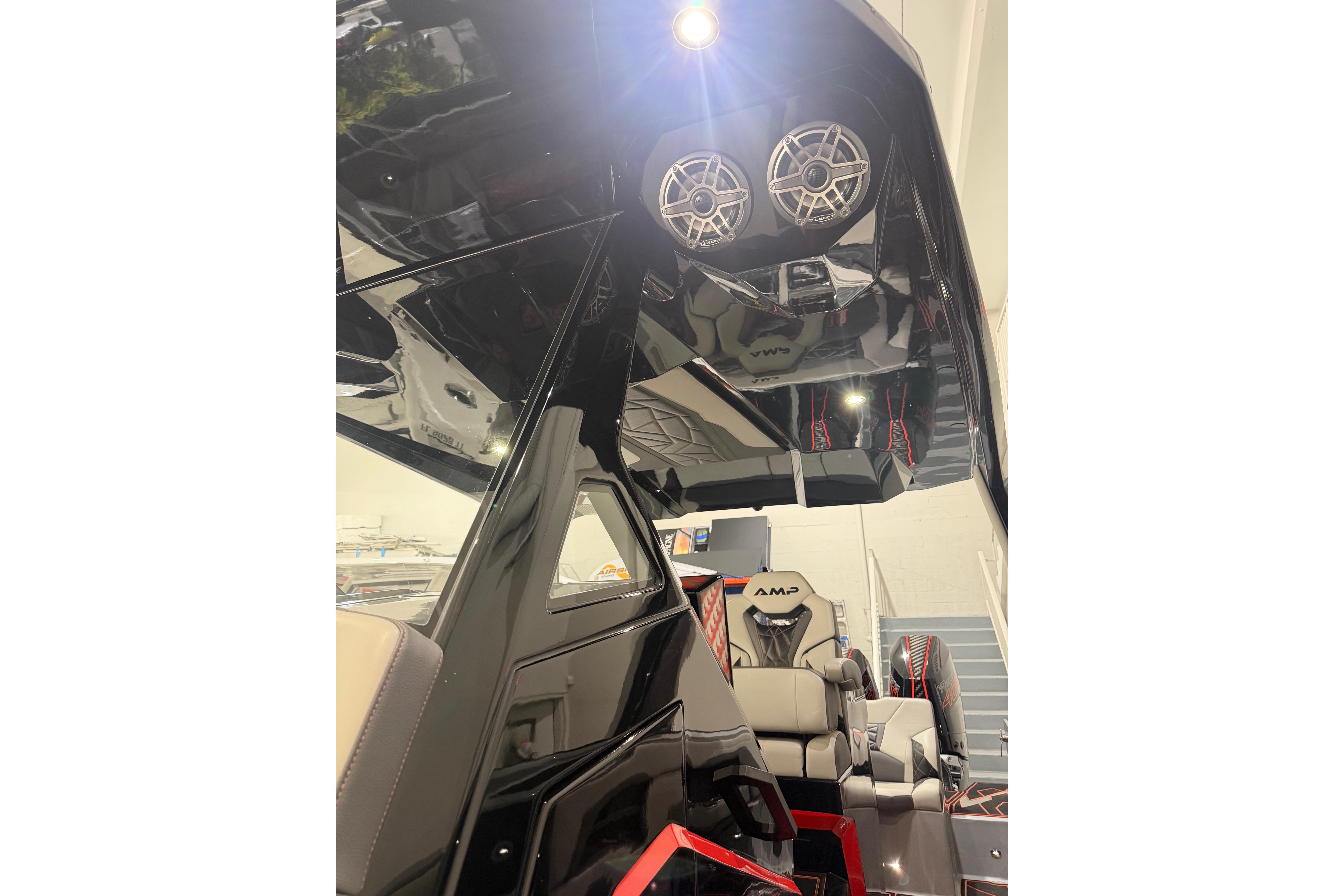Futuristic AMP 333 interior with sleek design and advanced audio system, 2026 model.