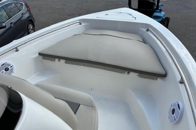2026 Key West 189 FS boat interior with cushioned seating and speakers.
