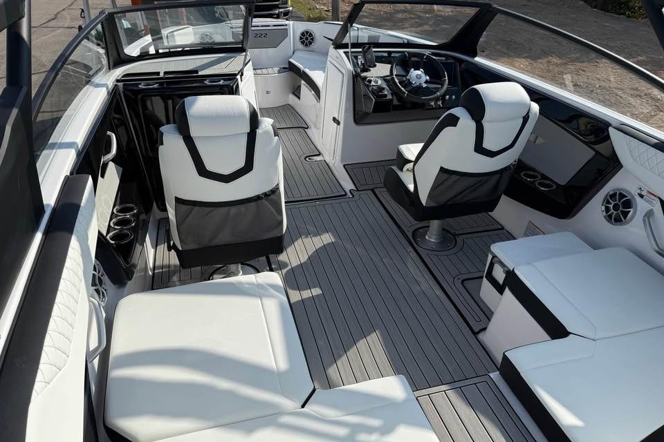 2026 Yamaha Boats 222S interior with sleek seating and modern dashboard design.