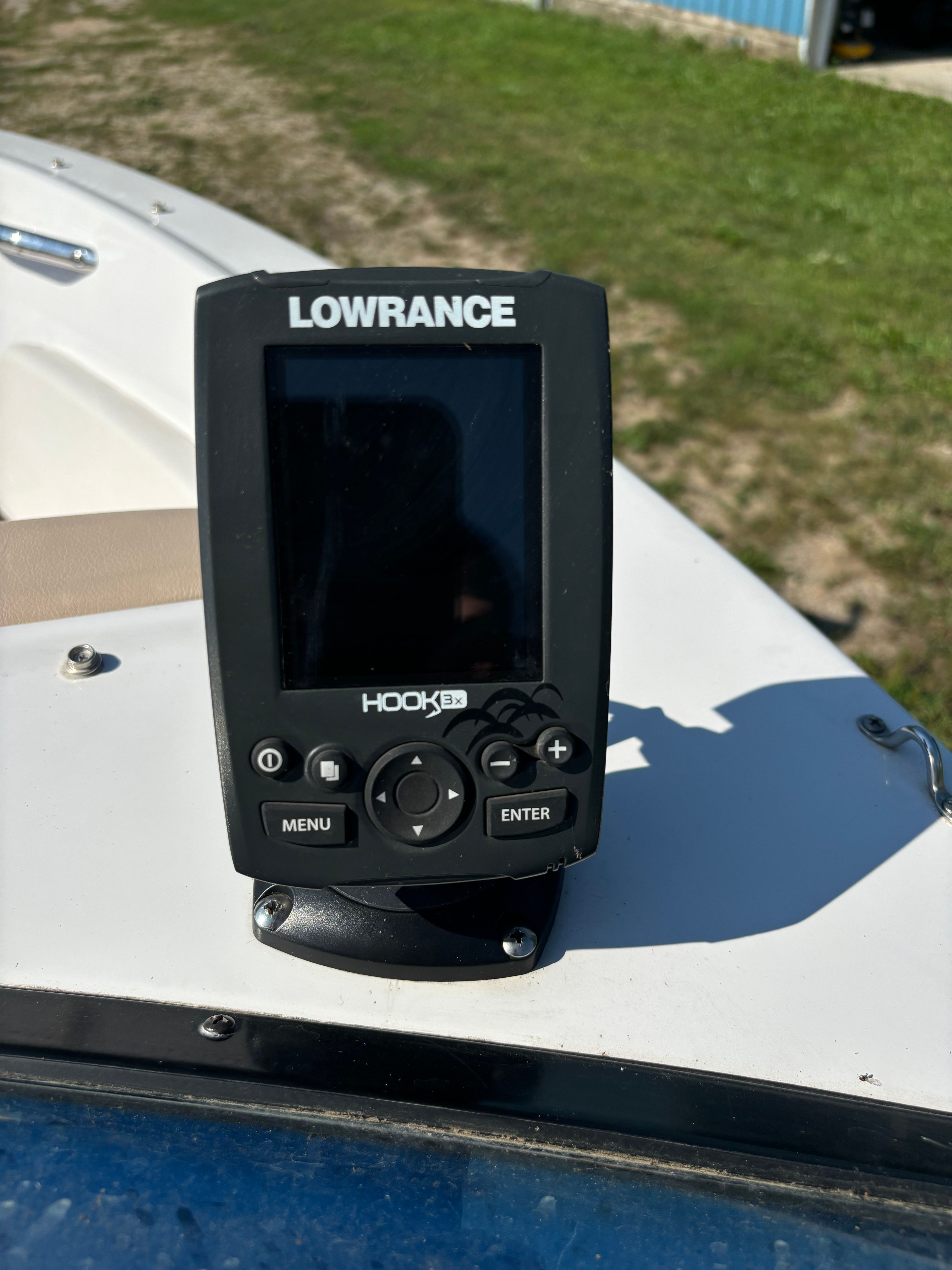 A Lowrance fish finder on a boat.