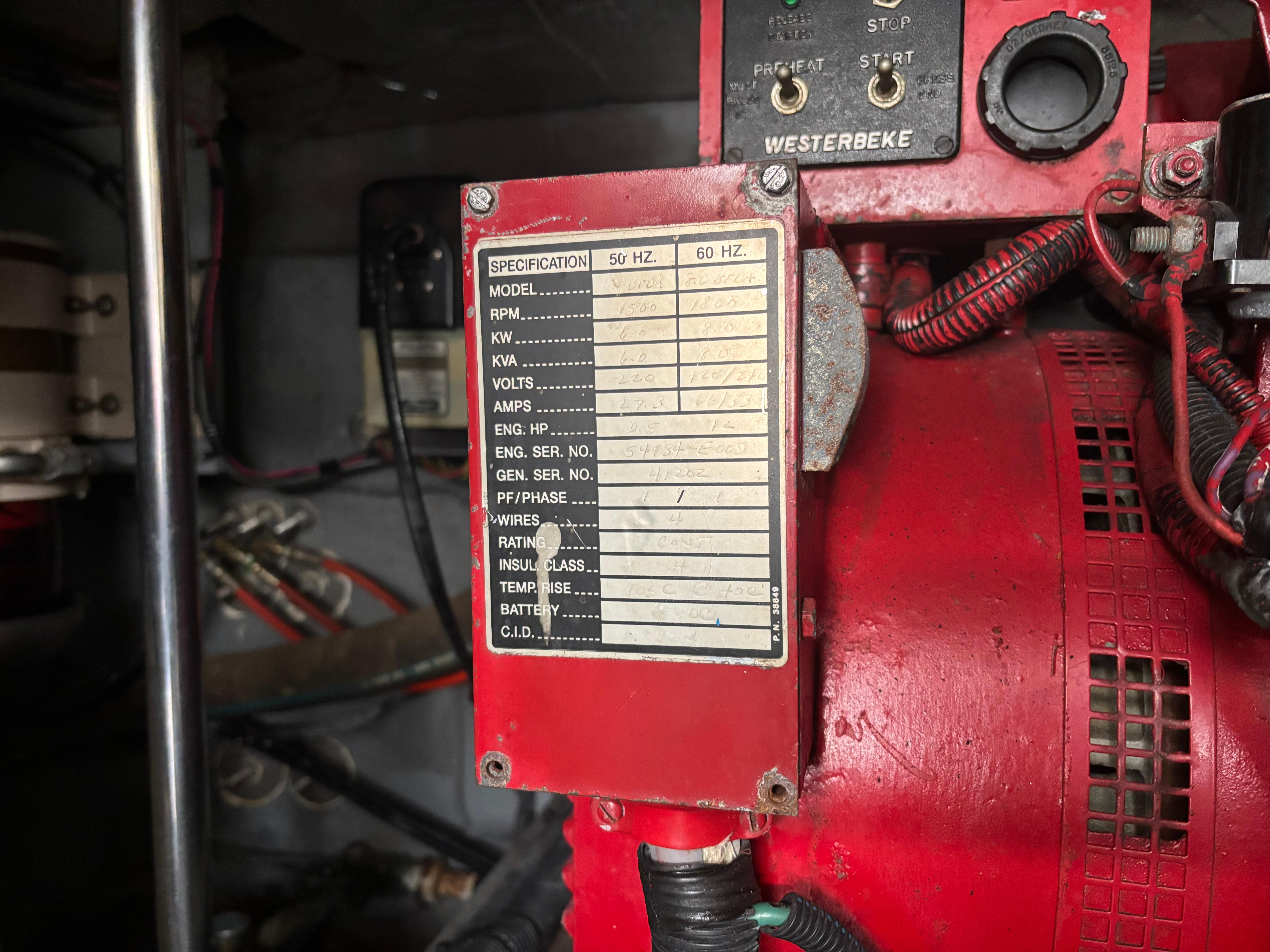 Close-up of a Westerbeke generator label inside a 2002 Sea Ray 450 Express Bridge.