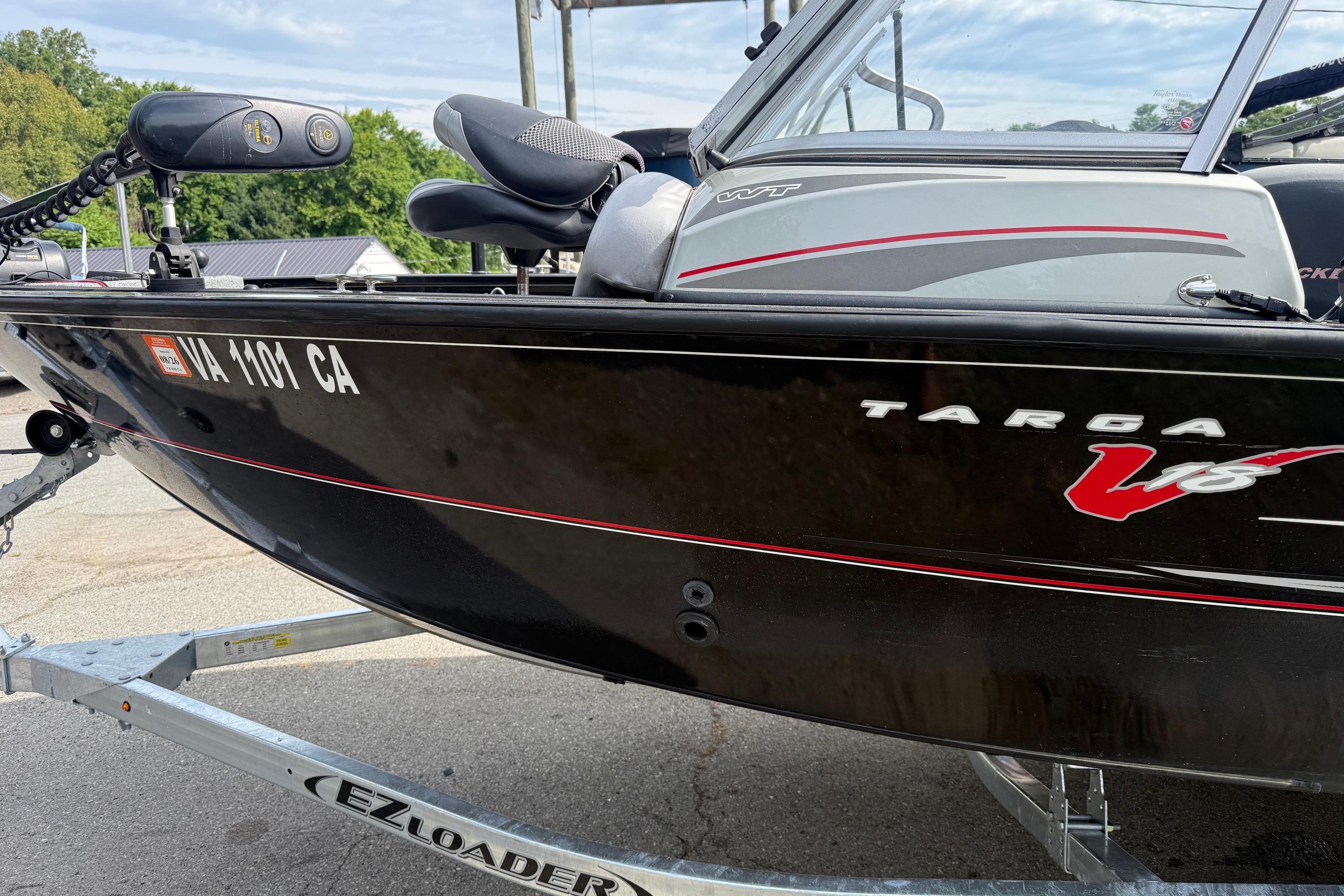2016 Tracker Targa V-18 WT boat on EZ Loader trailer, side view.