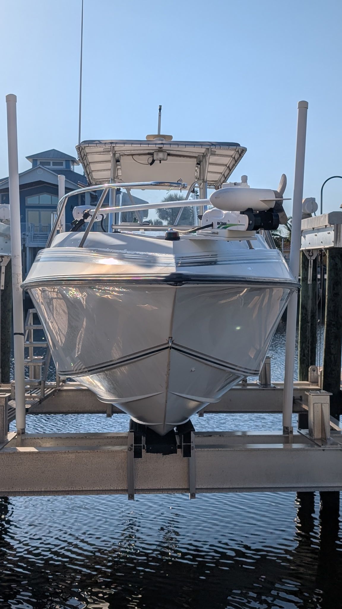 1997 Fountain Center Console boat on a boat lift.