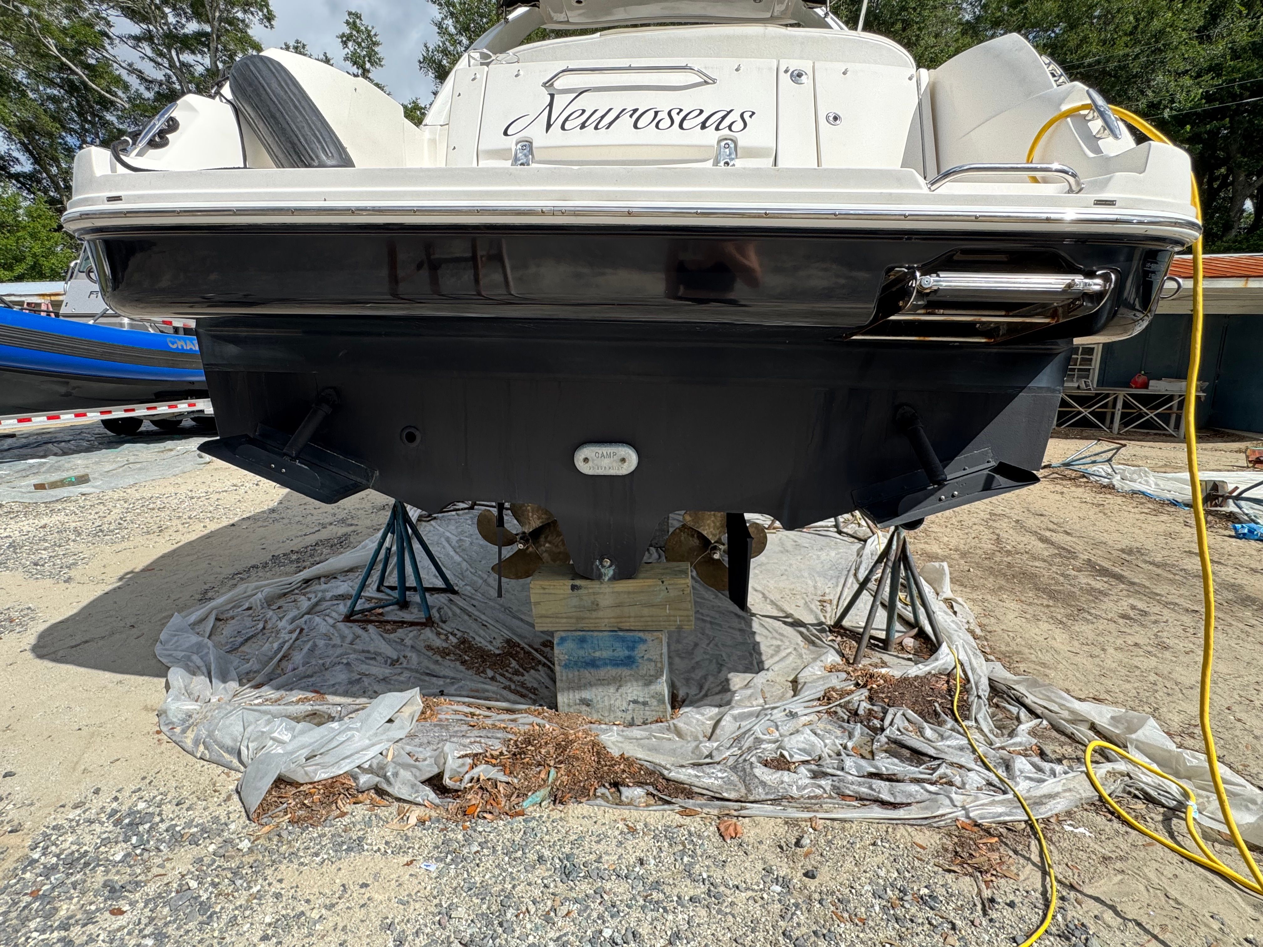 Rear view of a 2007 Sea Ray Sundancer 310 yacht on stands.