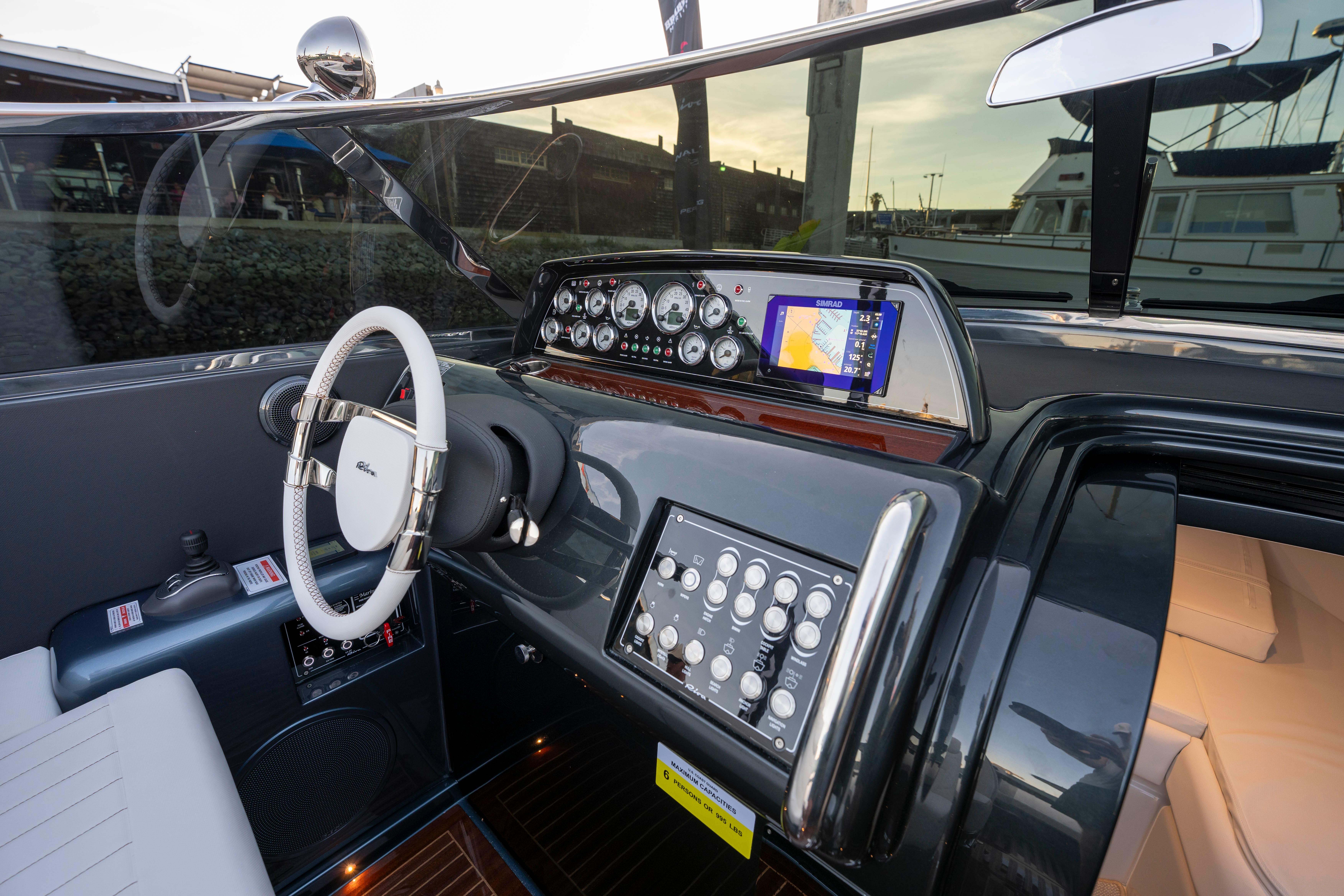 Cockpit of 2026 Riva 33' Aquariva Special with modern controls and navigation system.