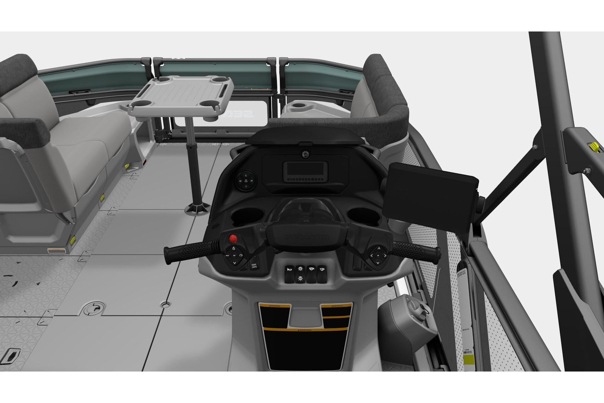 2026 Sea-Doo Switch Cruise 18 interior with steering console and seating area.