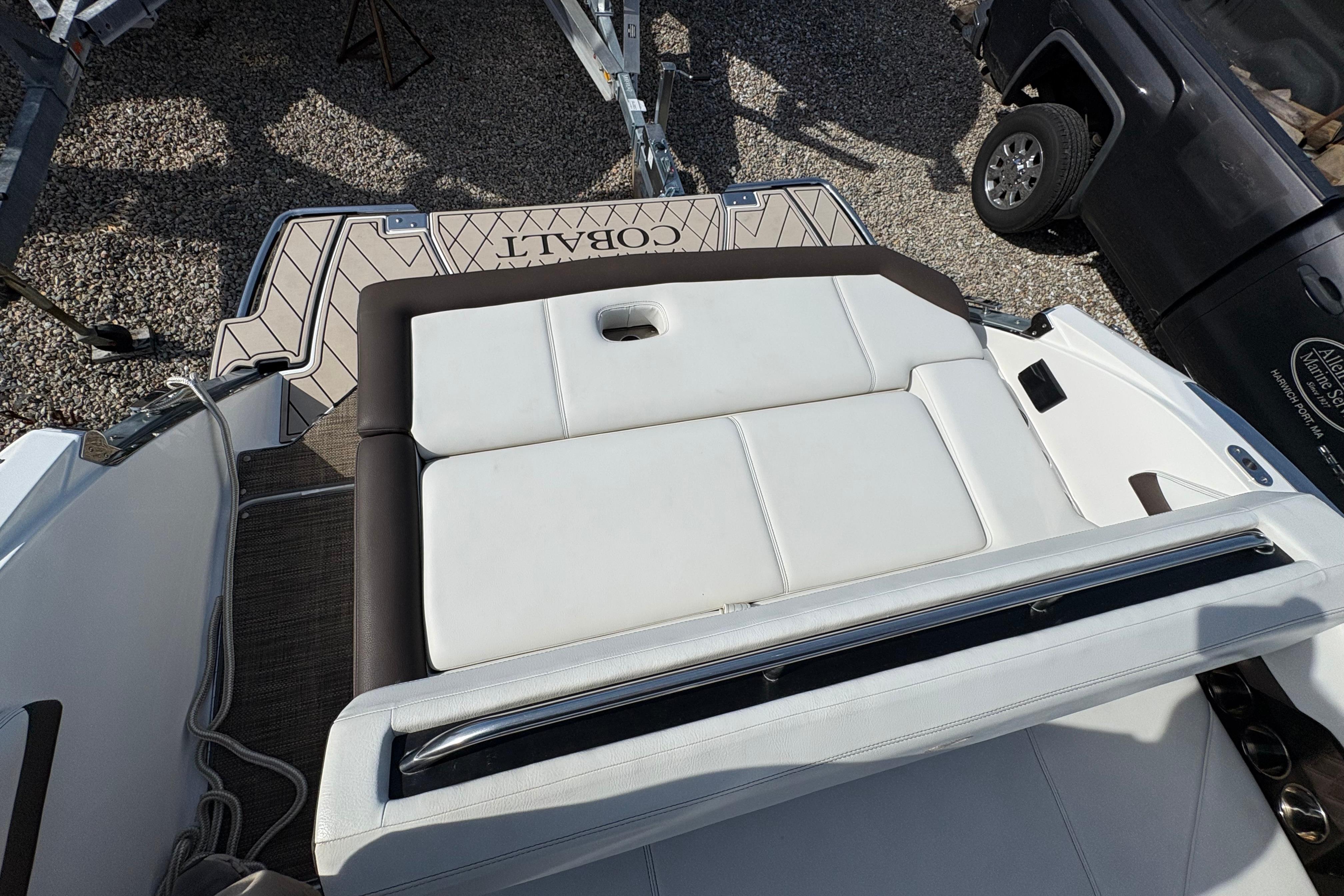 2022 Cobalt R6 boat with white cushioned seating and sleek design.