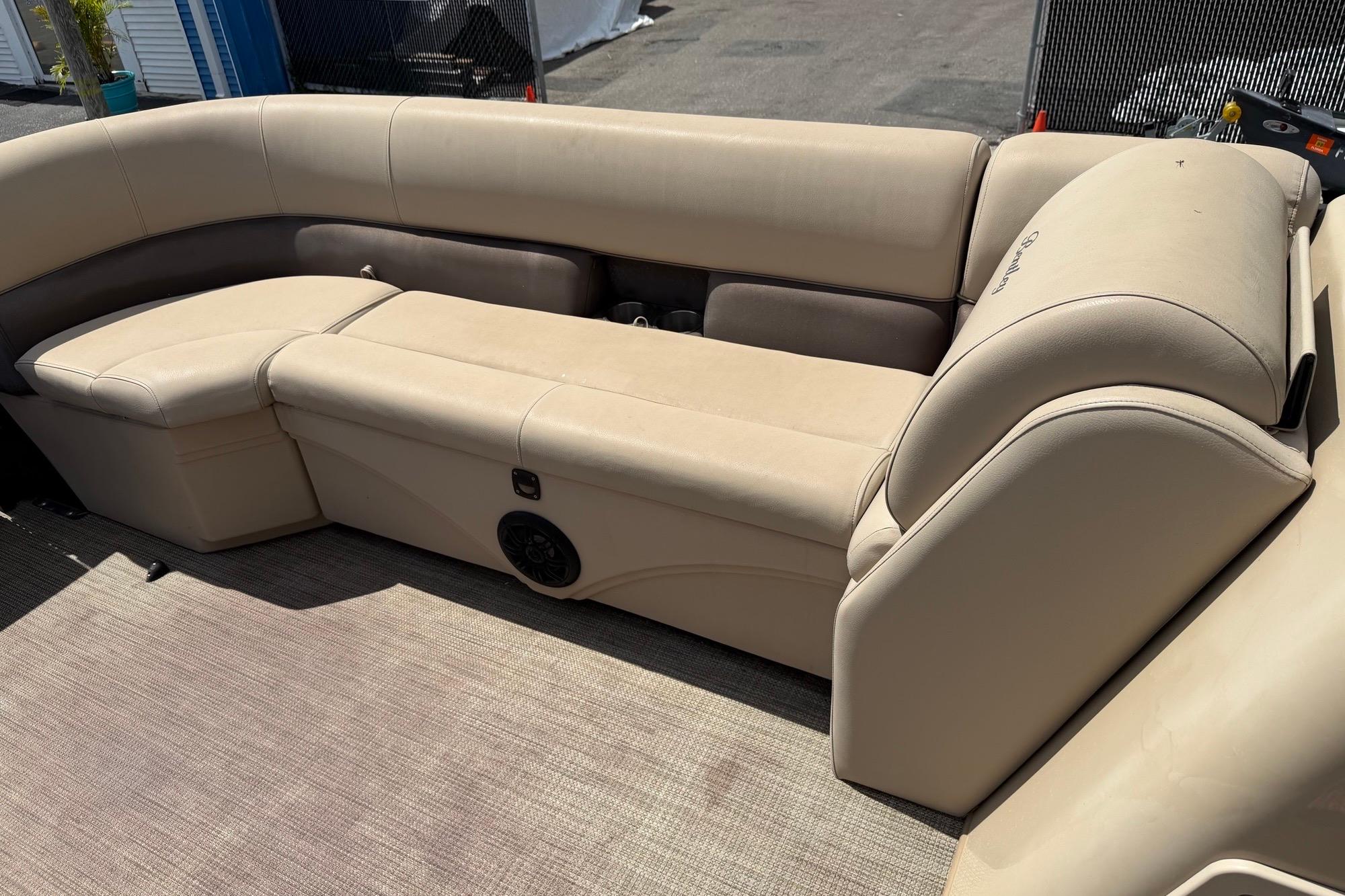 2022 Bentley Pontoons 240 CRUISE interior with beige seating and speaker system.