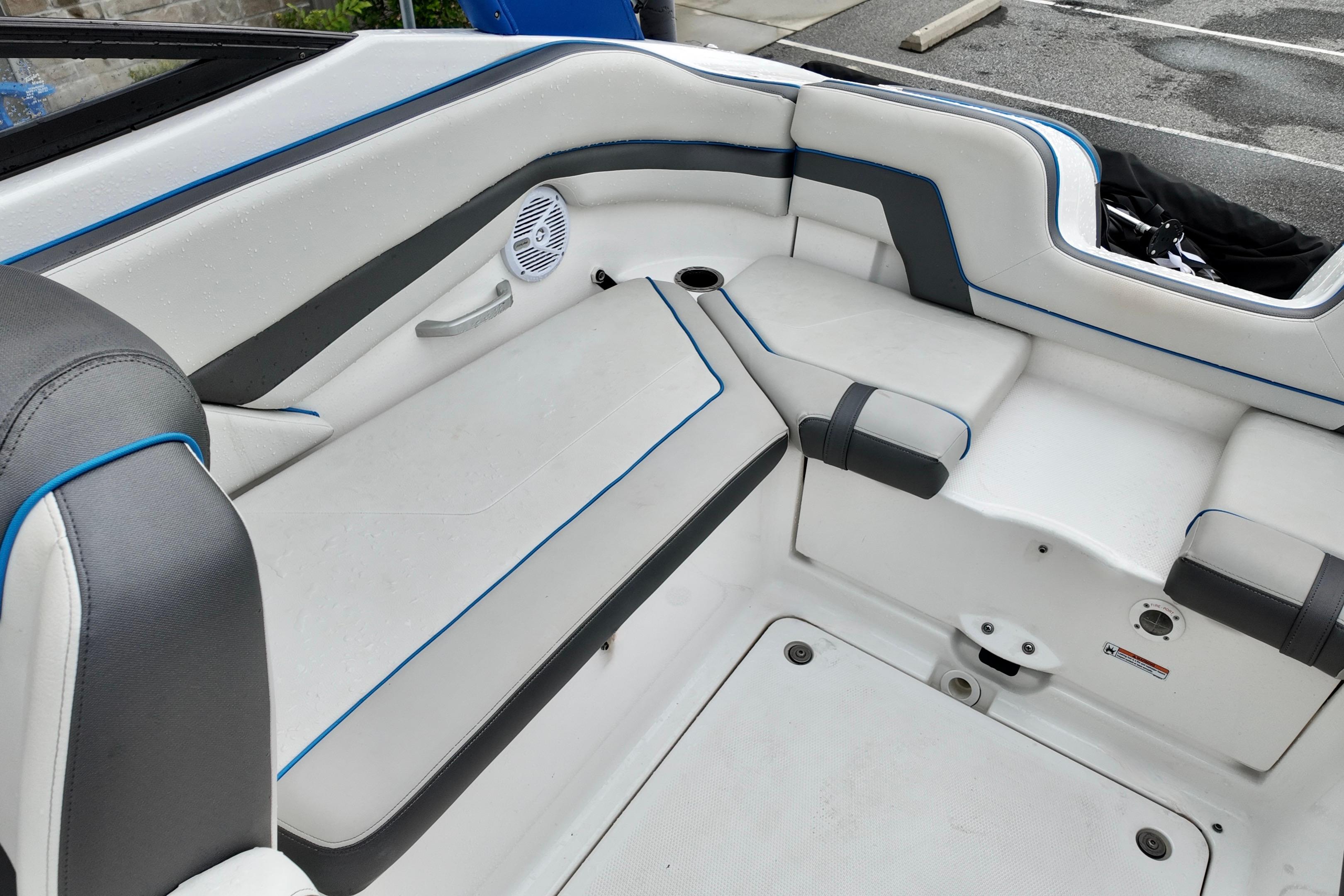 2020 Yamaha AR240 boat interior with cushioned seating and speaker.