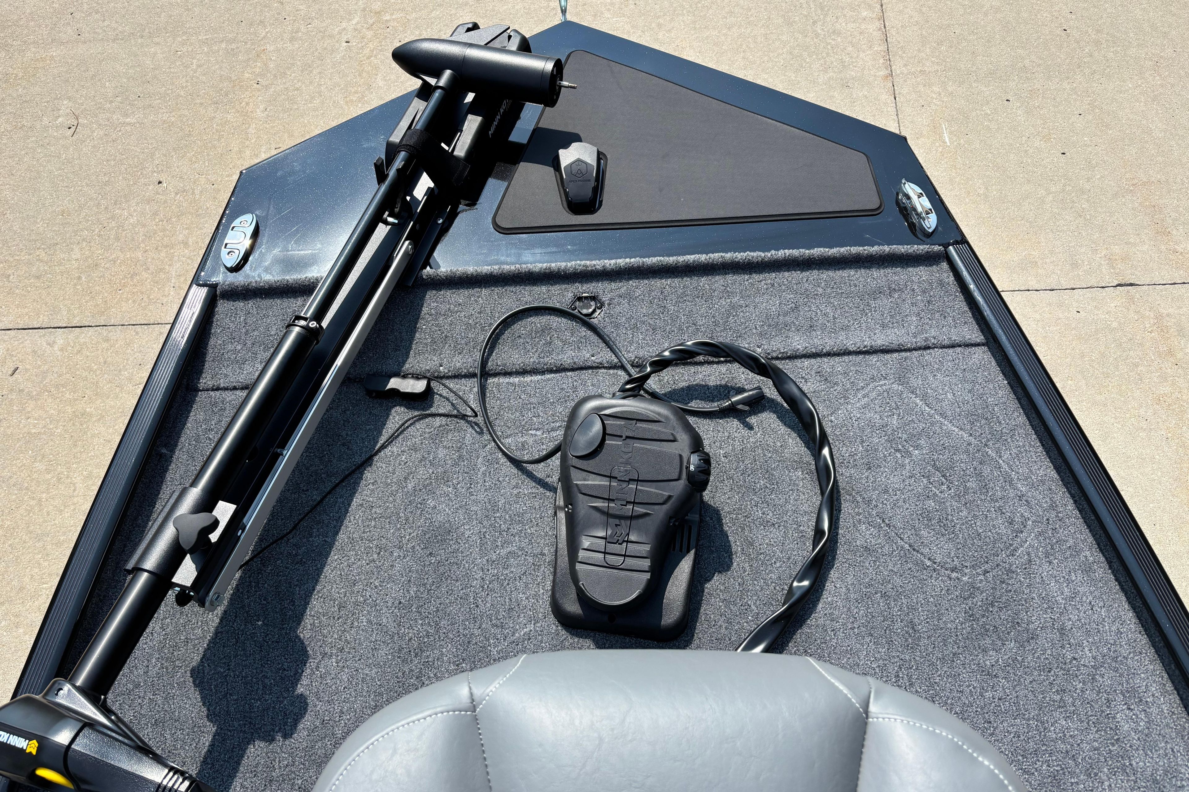 2026 Tracker Bass Tracker Classic XL boat deck with trolling motor and foot pedal.