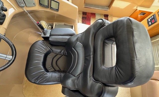 Luxurious leather seat in 2002 Carver 570 Voyager Pilothouse.