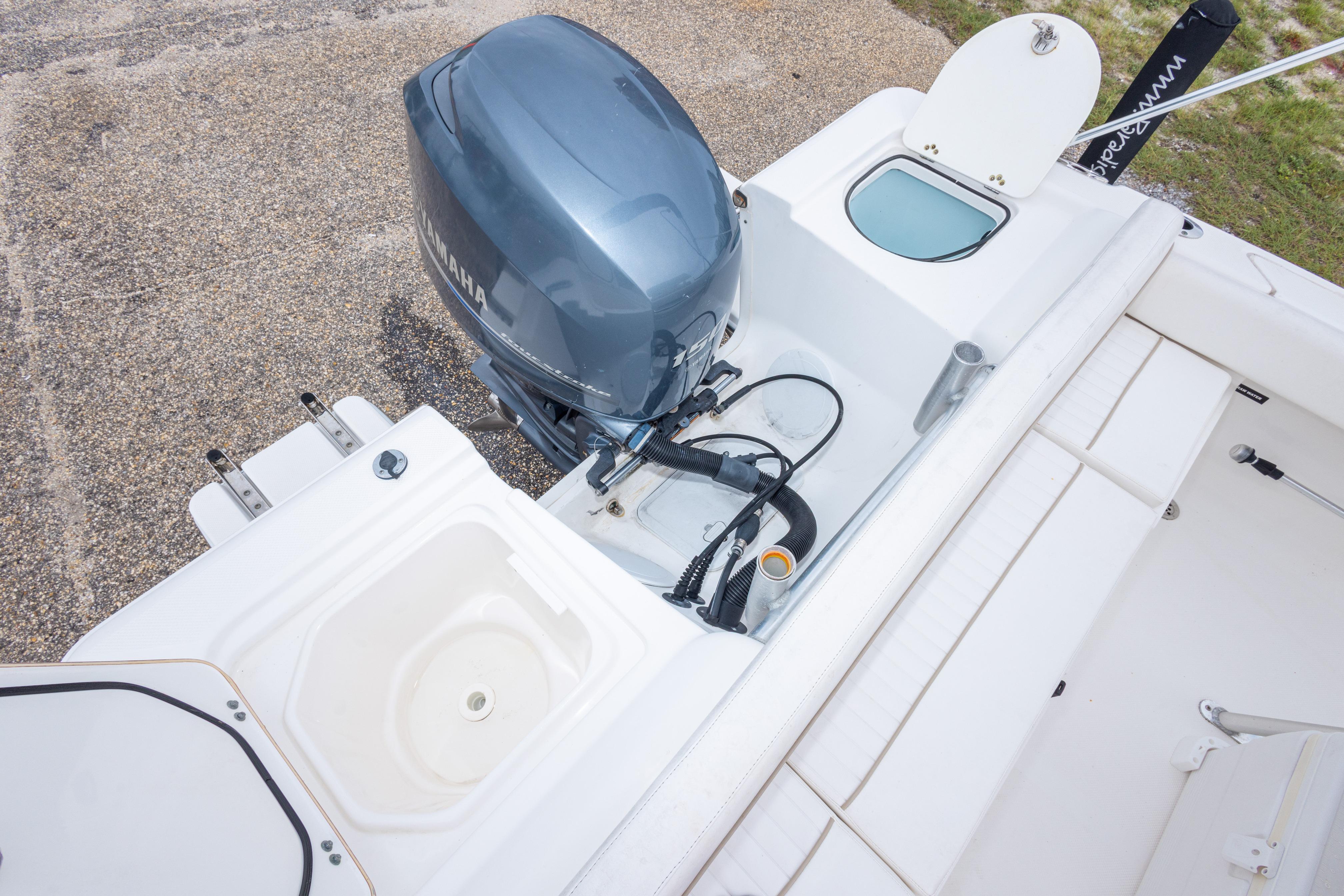 2014 Sea Fox 209 Commander boat with Yamaha outboard motor, featuring a clean deck layout.