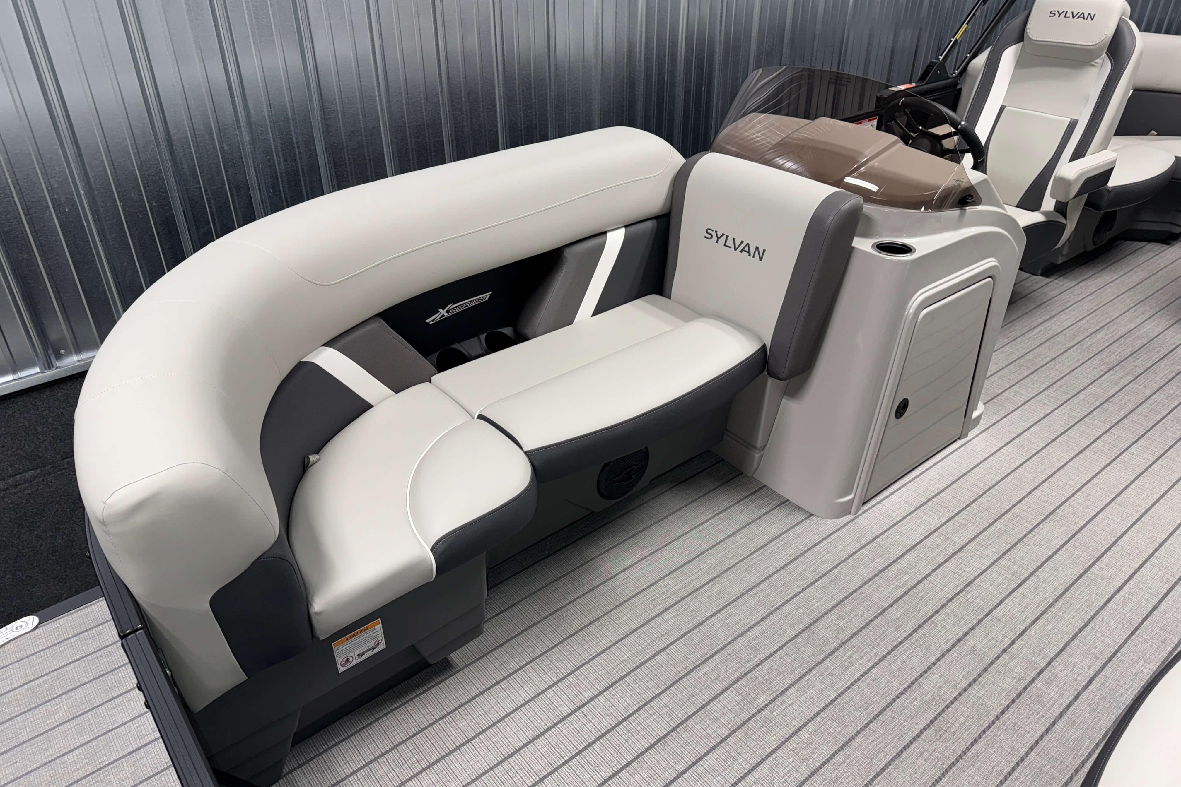 2026 Sylvan Mirage X1 boat interior with sleek seating and modern design.