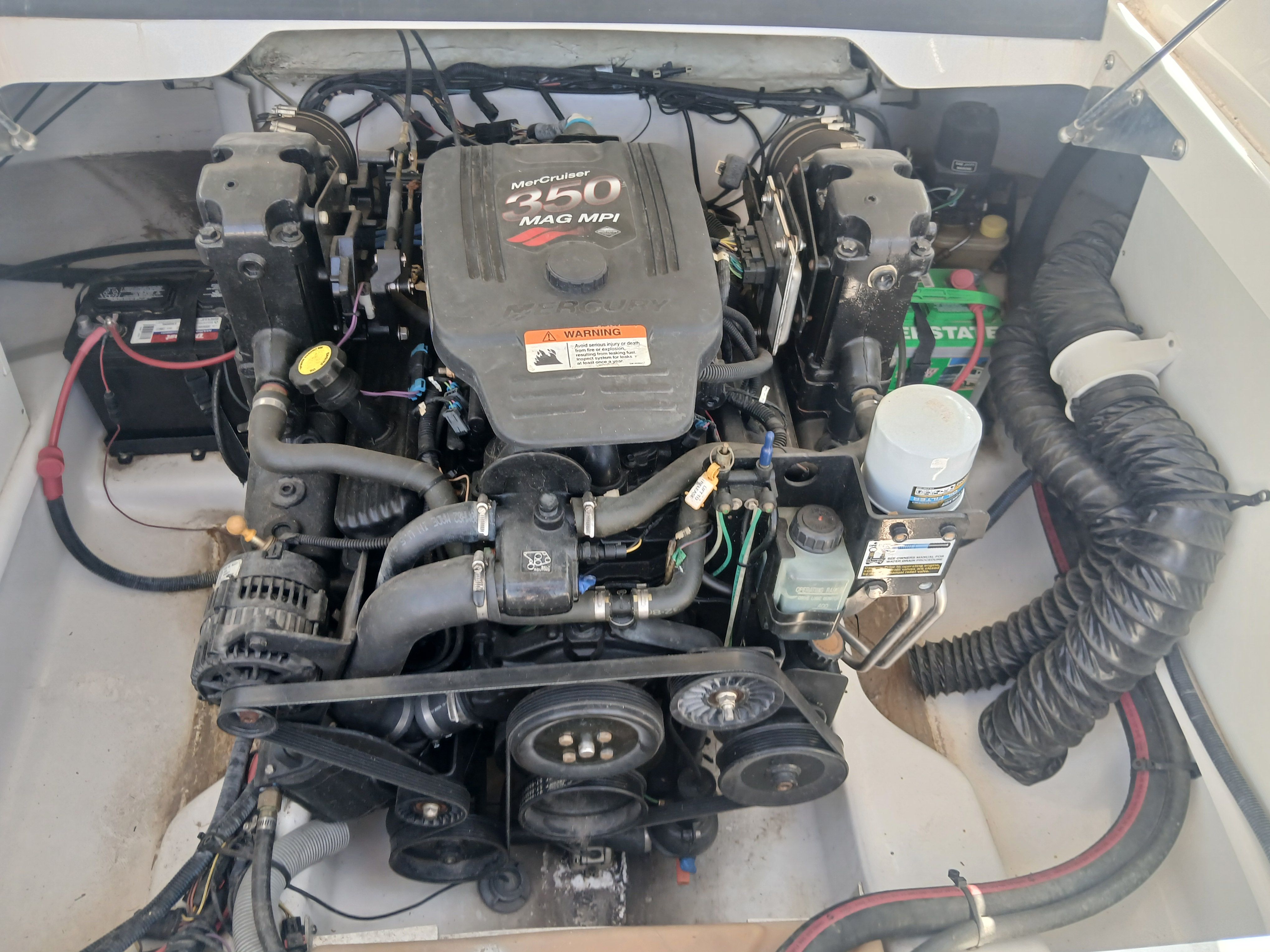 Engine compartment of a 2008 Four Winns H220SS with MerCruiser 350 MAG MPI.