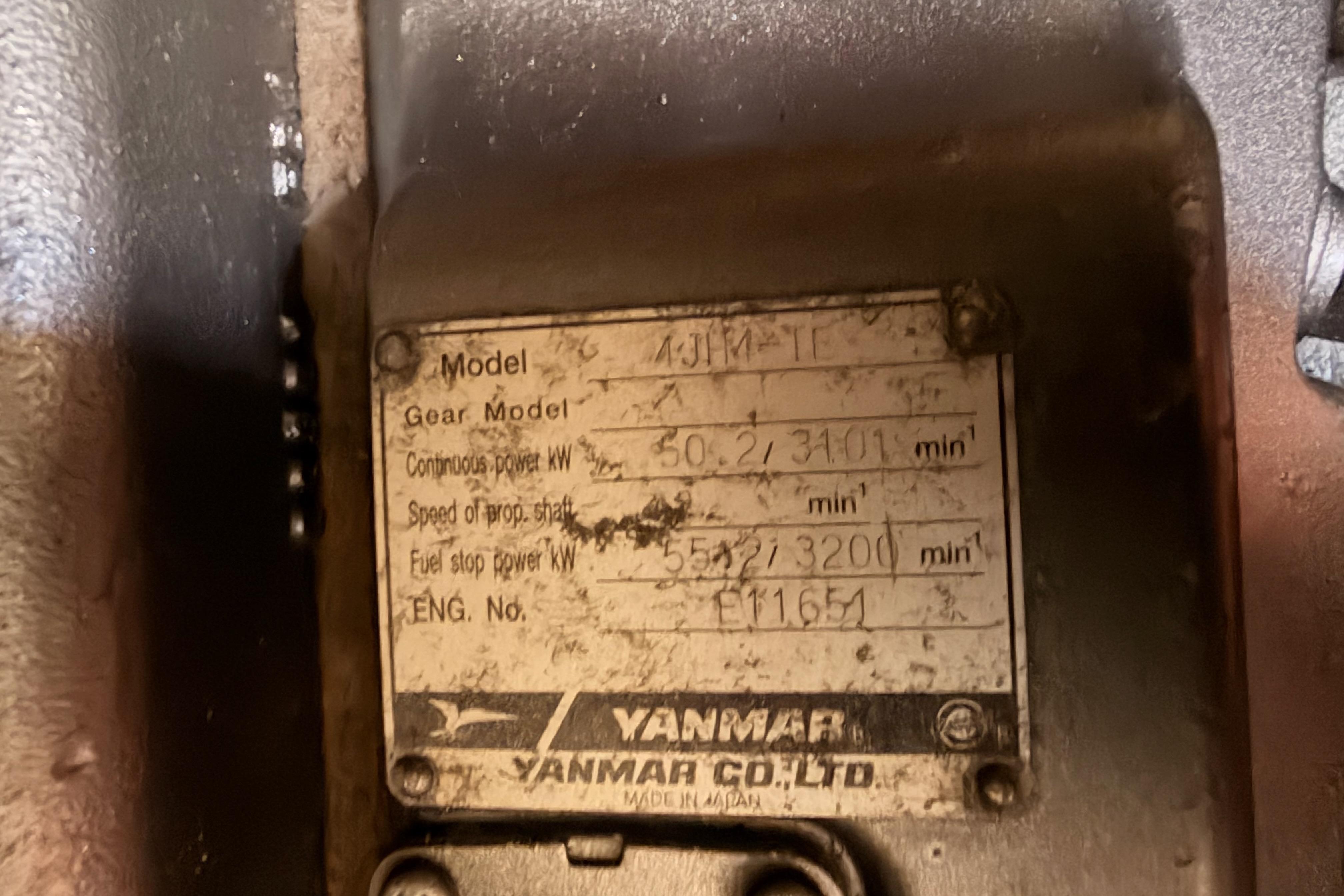 Yanmar engine plate on a 1991 Hylas 51, displaying model and power specifications.