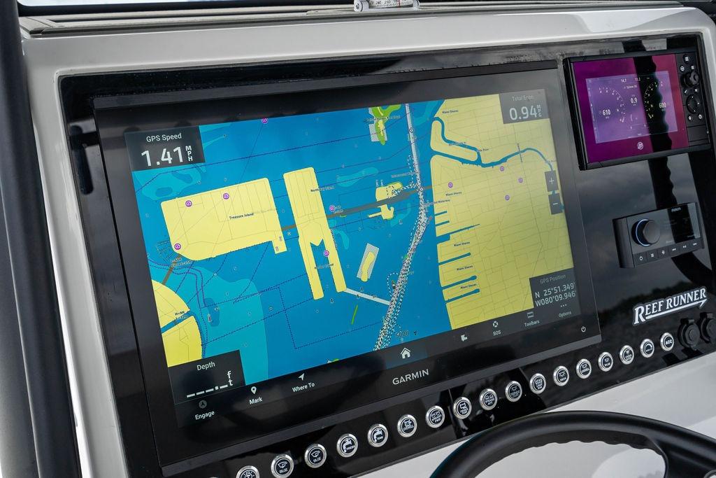 Garmin navigation display on 2027 Reef Runner 280 boat dashboard, showing detailed marine map.