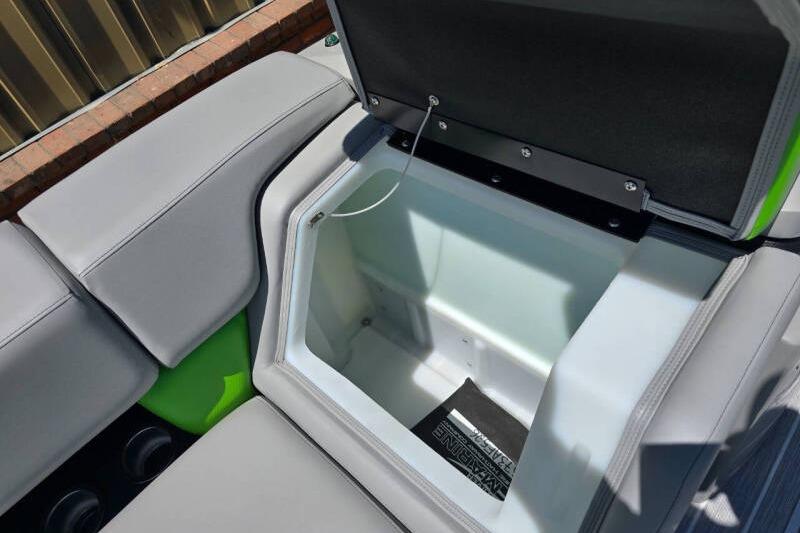 Open storage compartment in 2026 Berkshire STS Arch Performance Series boat.