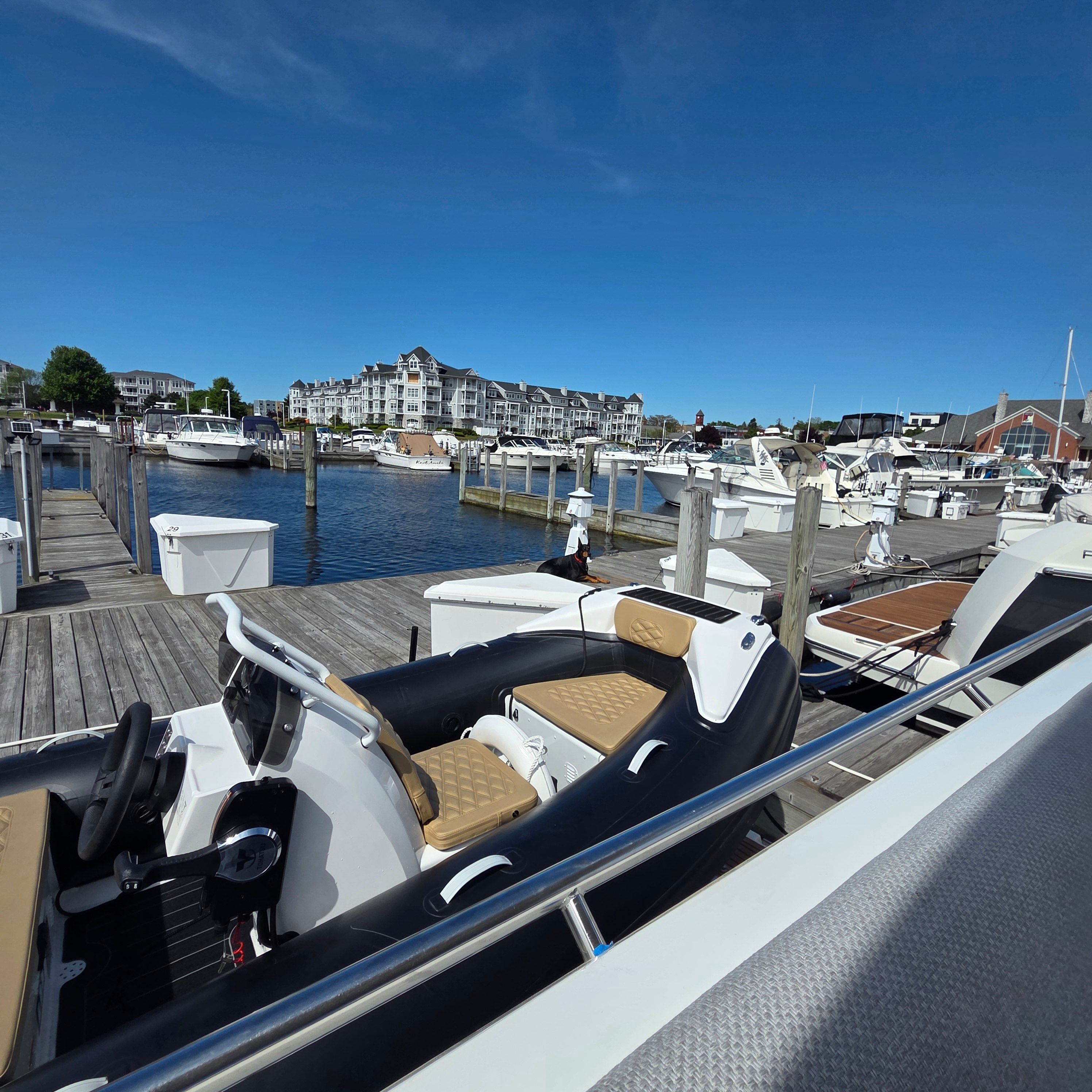 2024 Highfield Sport 390 boat docked at marina.