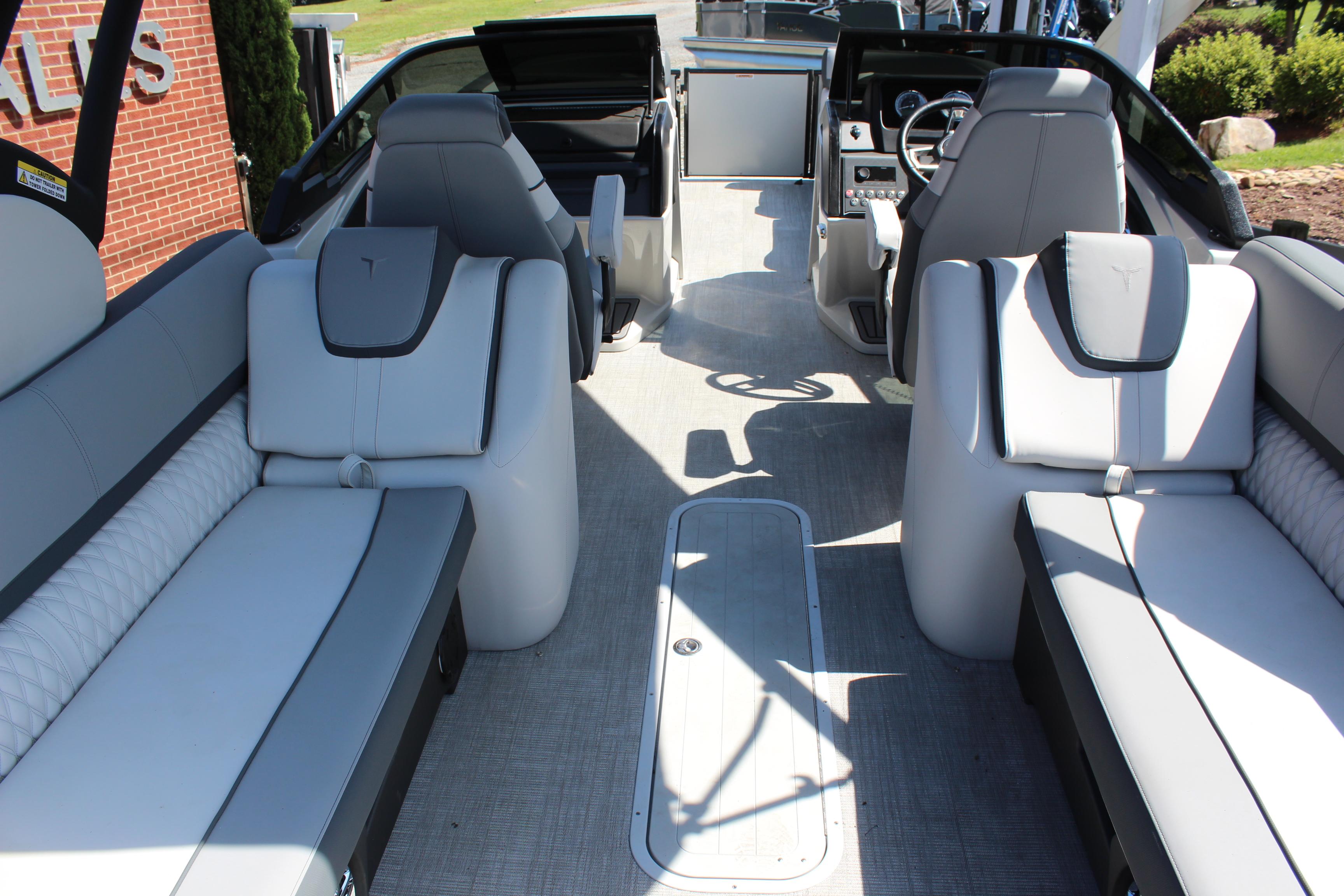 2025 Tahoe Pontoon Cascade Quad Lounge Windshield interior with luxurious seating and modern design.