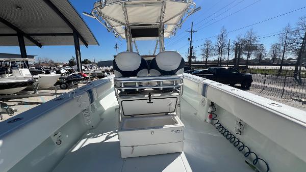 2005 Contender 36 Open boat interior with seating and storage compartments.