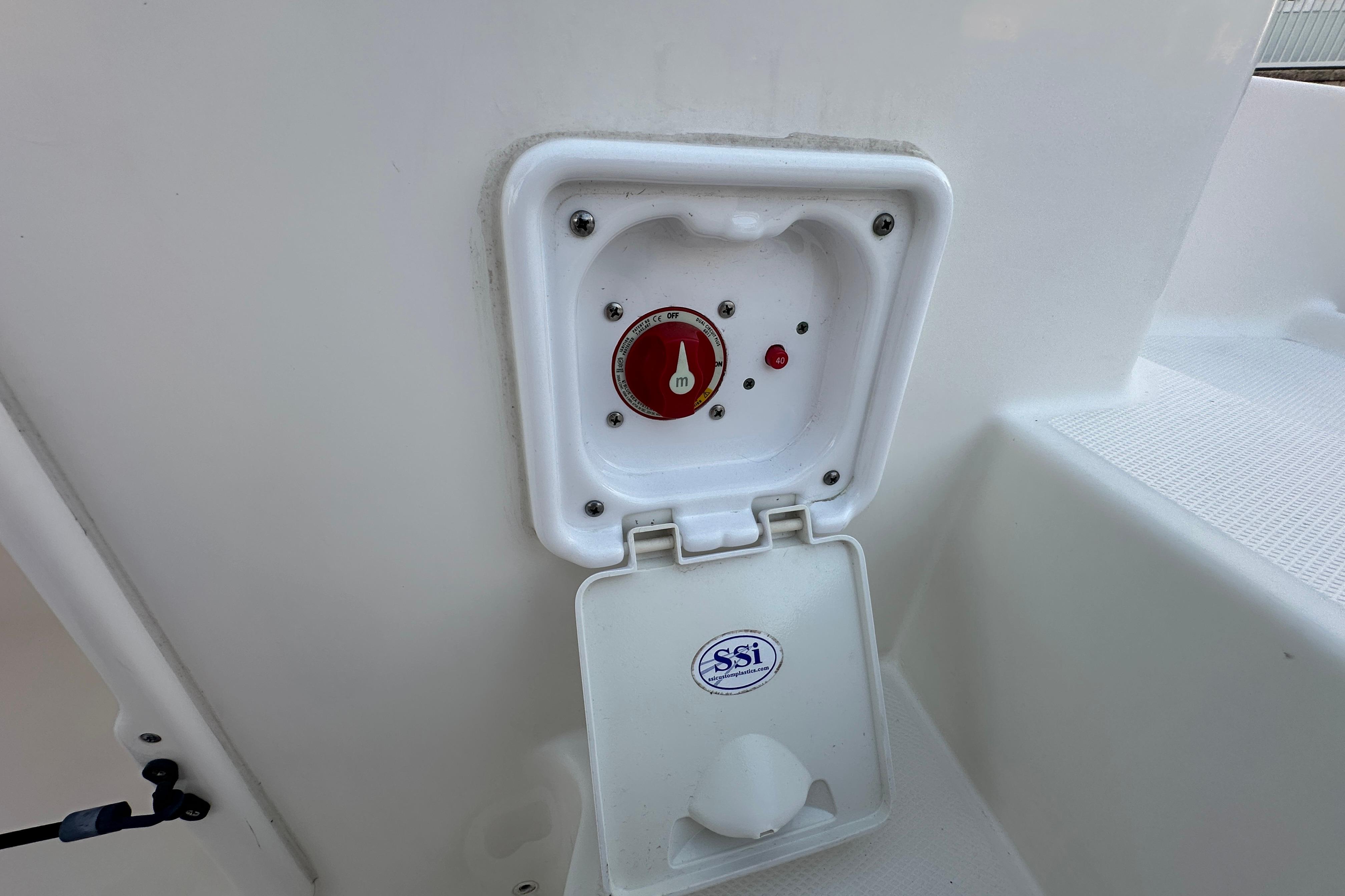 Battery switch compartment on a 2021 World Cat 230 SD boat.