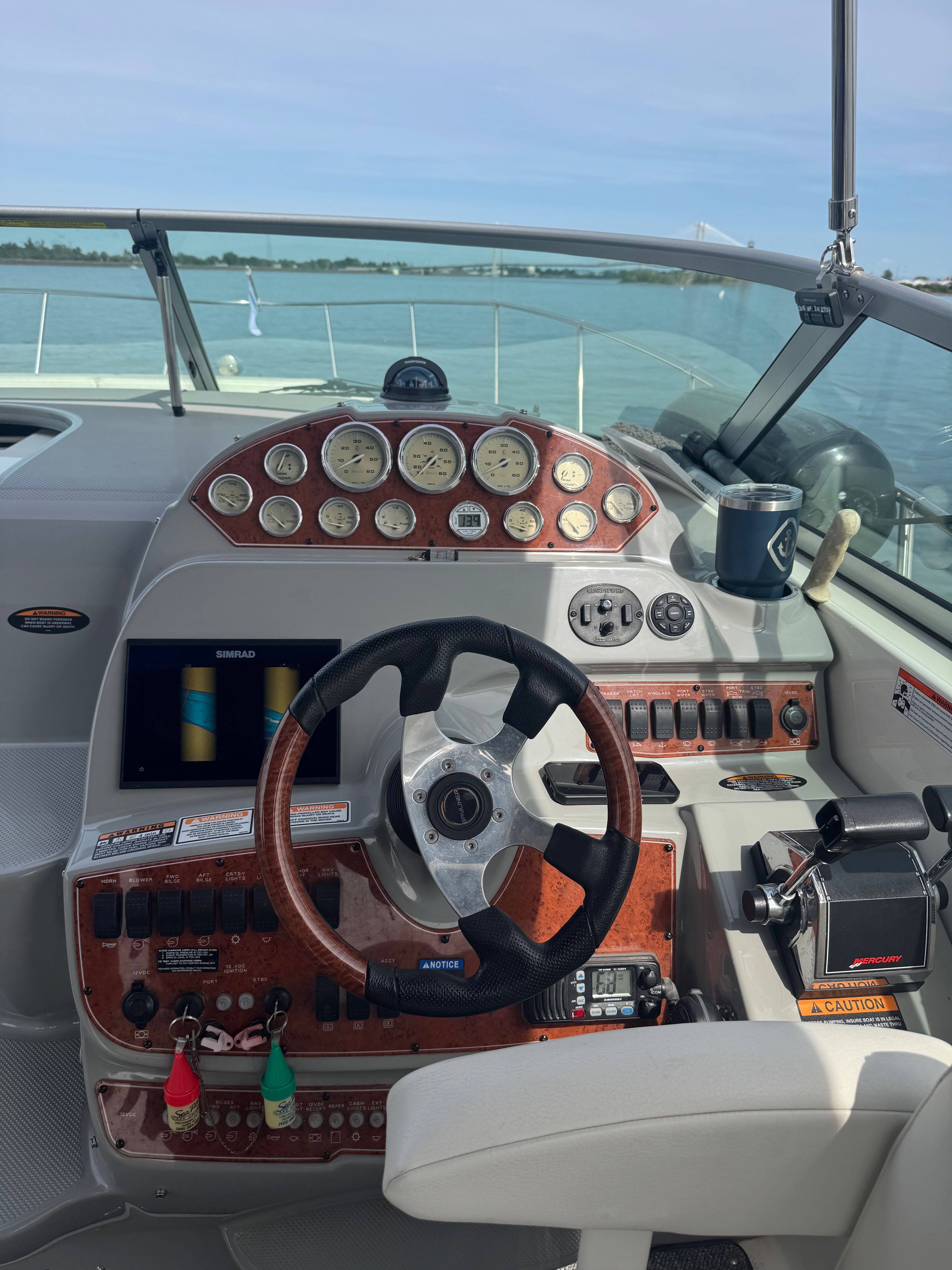 Bayliner 340 yacht helm with instruments and steering wheel, 2008 model.