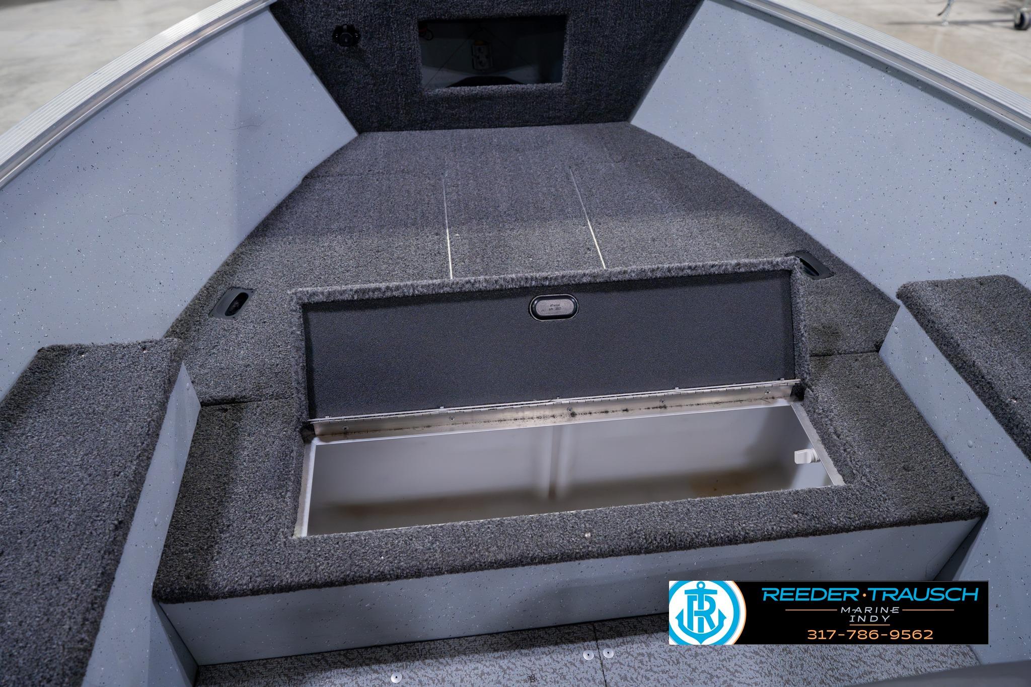 2023 Lund 1600 Fury Tiller boat interior with open storage compartment.