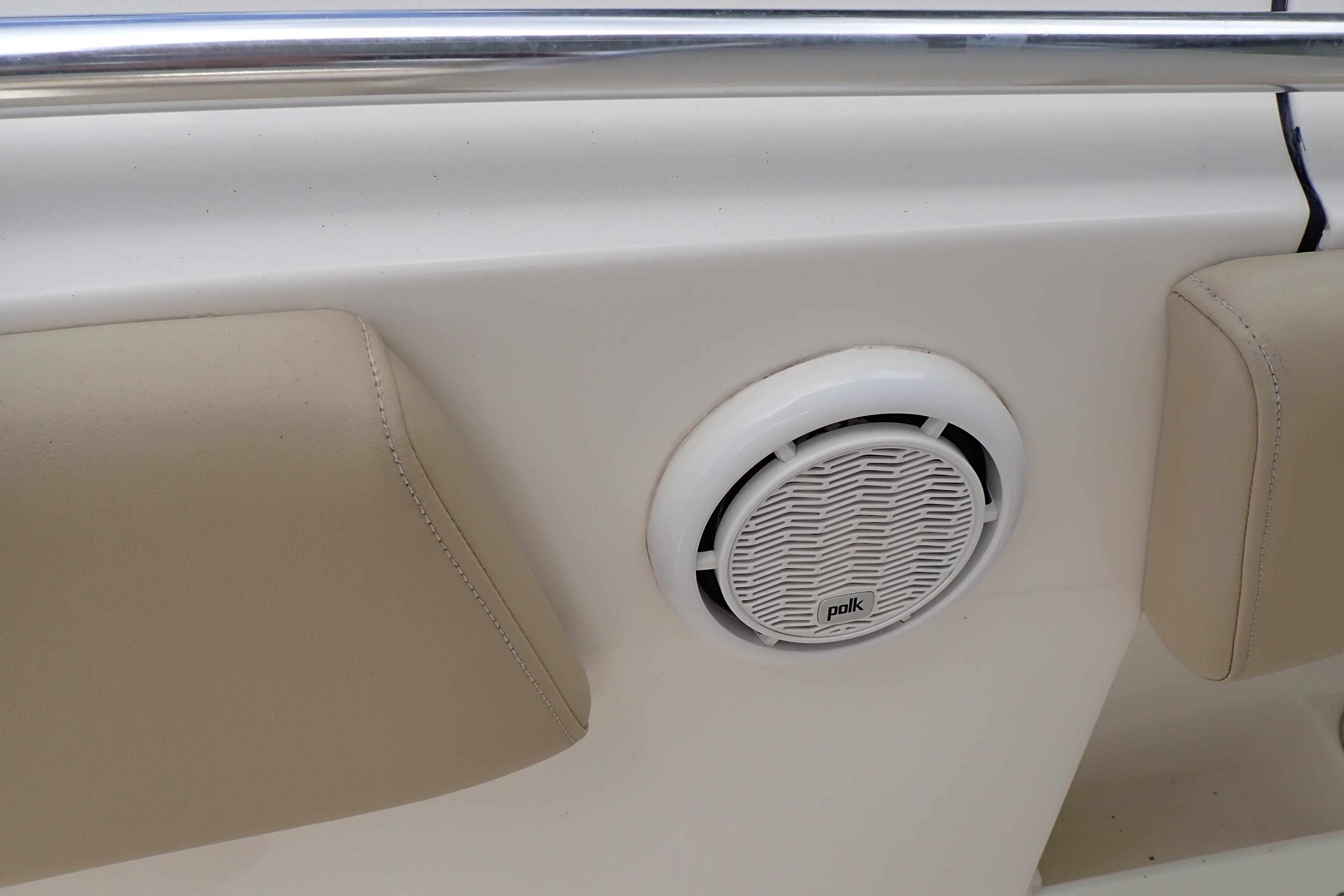 2019 Key West 263 FS boat interior with Polk speaker and beige seating.