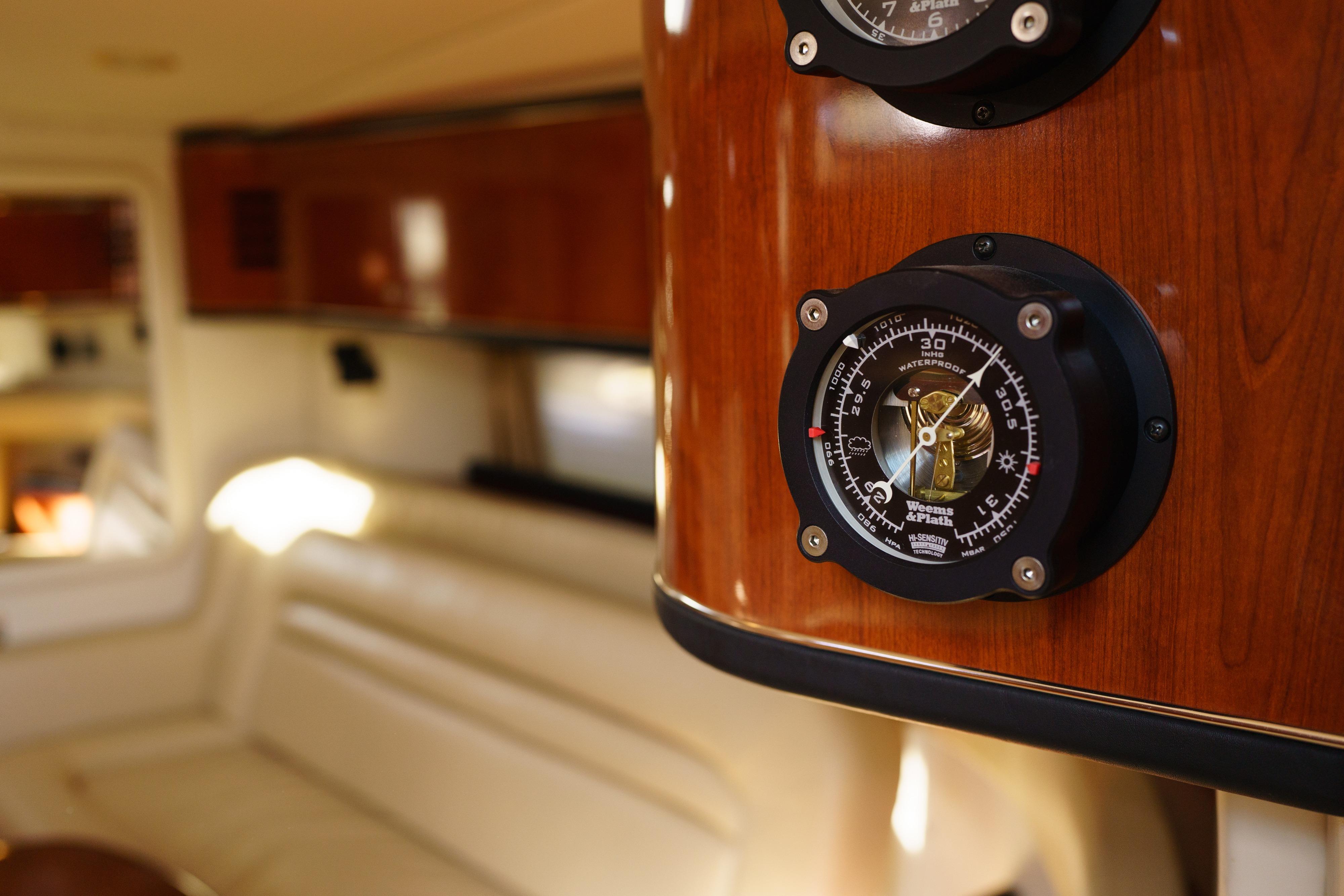 Interior of 2004 Sea Ray Sundancer 460 yacht with nautical instruments.