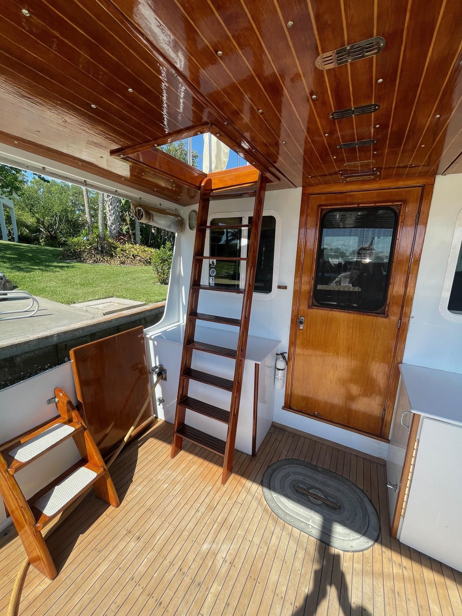 1979 Jarvis Newman Trawler with wooden interior and exterior detailing.