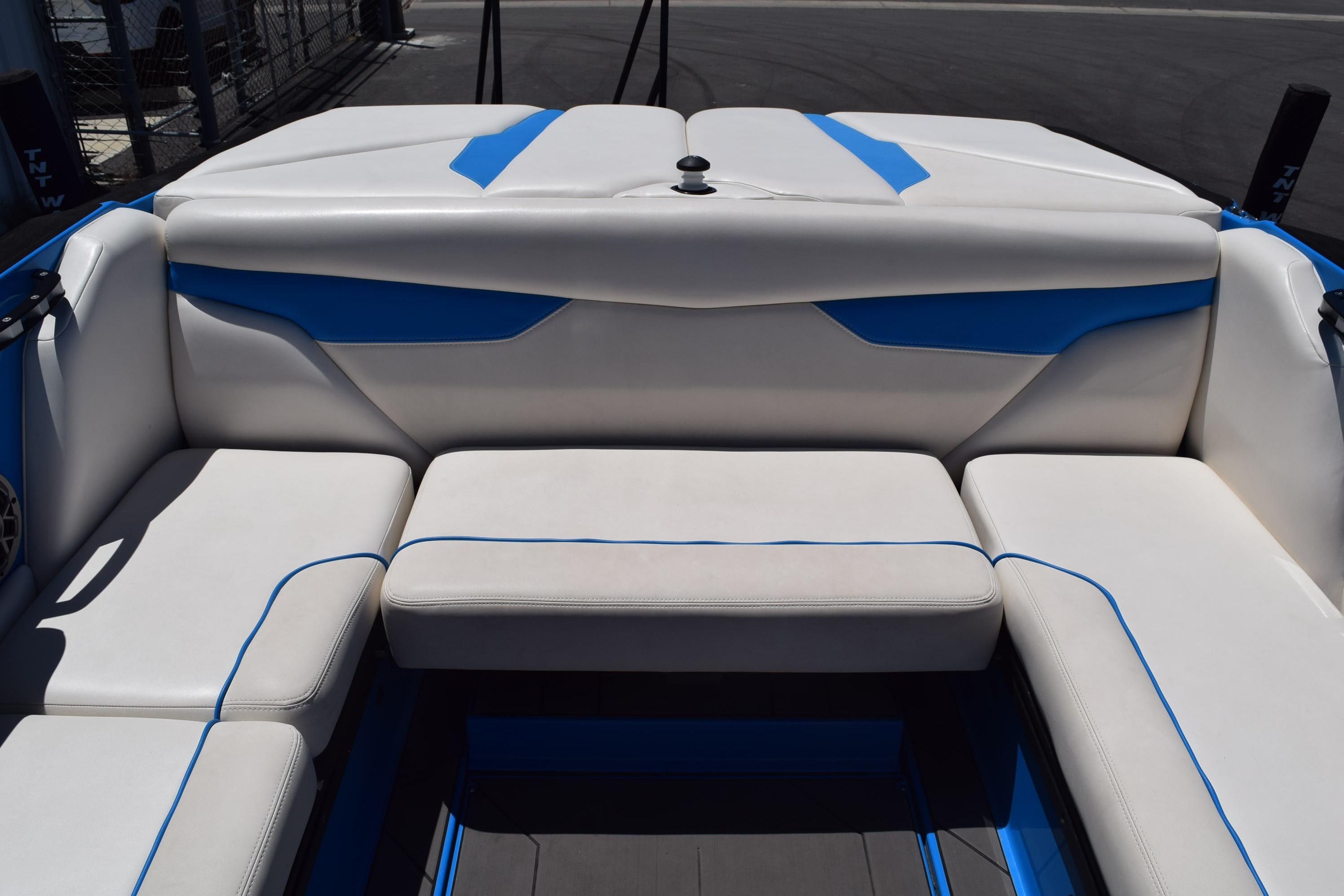 2019 Axis A22 boat interior with white and blue seating arrangement.