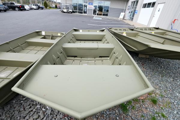 2023 Crestliner 1648M CR Jon boat displayed outdoors.