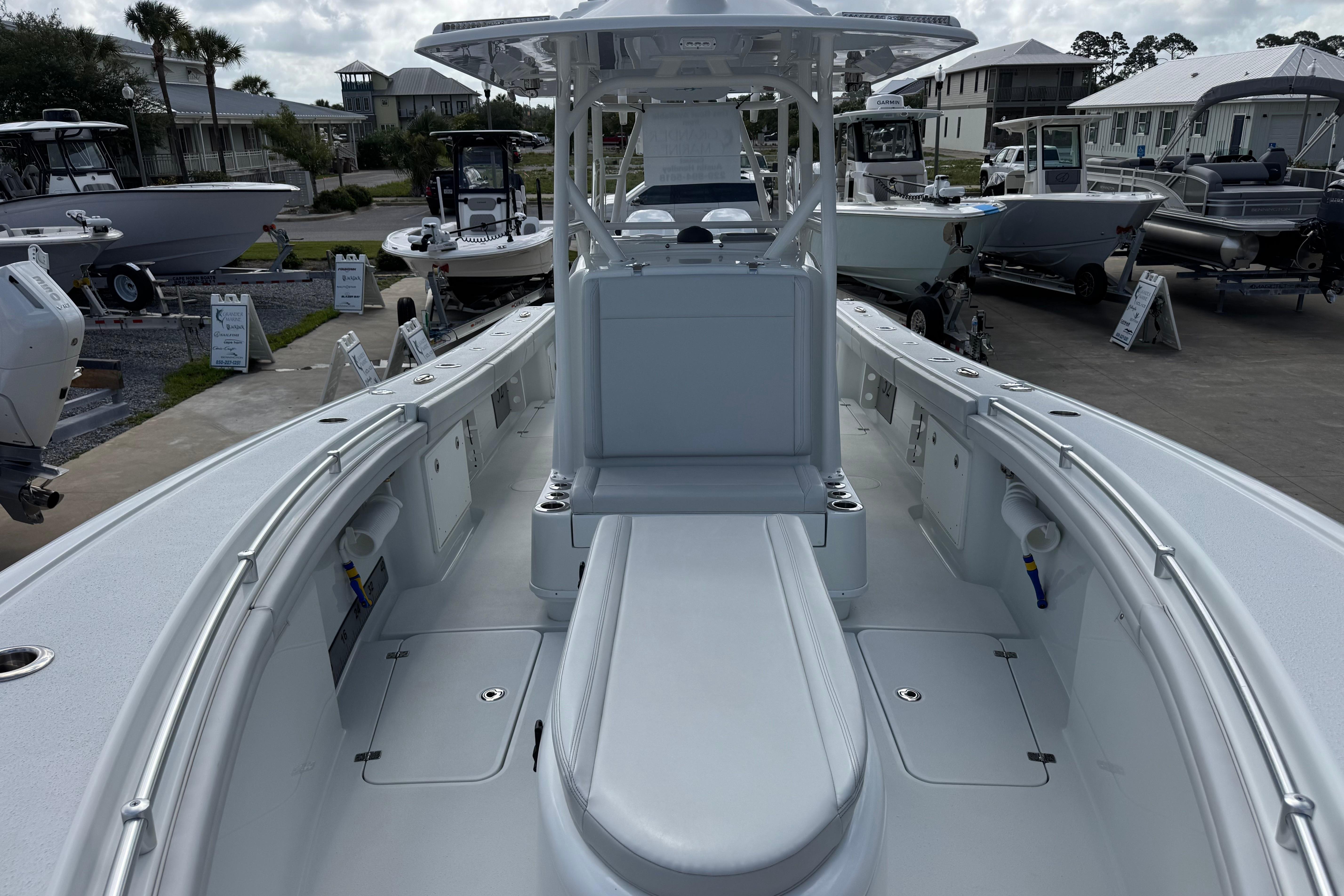 2022 Yellowfin 32 Offshore boat interior, showcasing spacious deck and seating area.