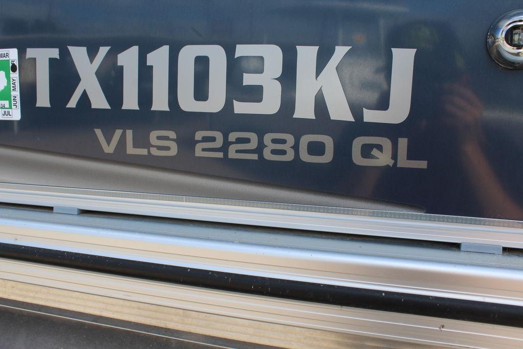 Close-up of 2021 Avalon VLS Quad Lounge 22 FT boat registration details.